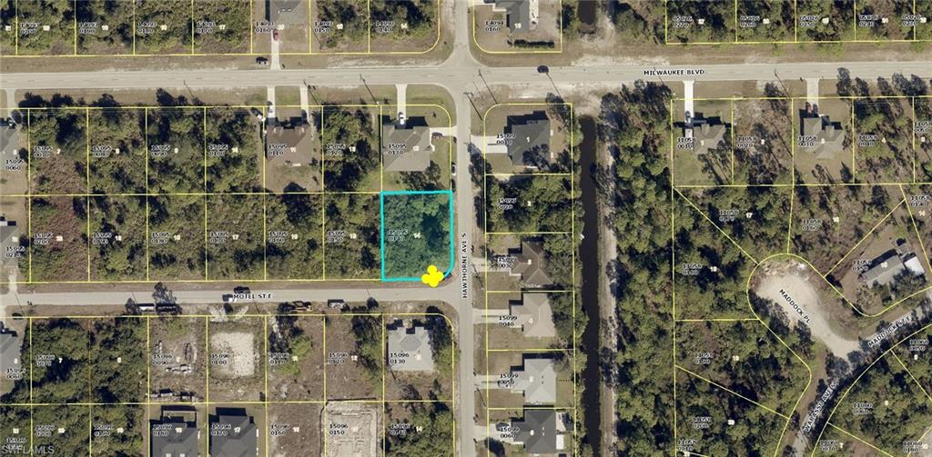 Rare opportunity! Build your next income-producing property on this oversized corner duplex lot in a growing area of Lehigh Acres. Located just blocks from East Lee County High School, this spacious lot offers excellent visibility, added design flexibility, and convenient access to SR-82, shopping, dining, and everyday amenities. Whether you're building a duplex to generate rental income or expanding your investment portfolio, this property is full of potential.