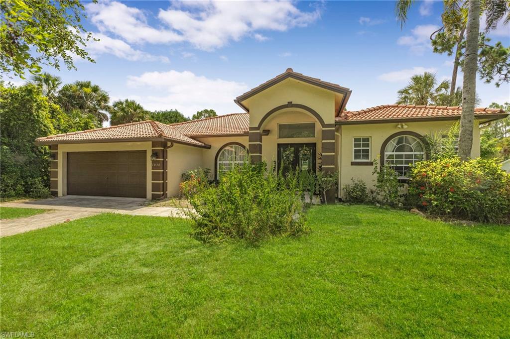 Don't miss this exceptional concrete block home with a durable tile roof, perfectly situated in one of the most sought-after areas of Golden Gate Estates. Conveniently located just minutes from Collier Boulevard and White Boulevard, this spacious property offers the perfect combination of comfort, convenience, and versatility for a large or multi-generational family.

Step inside to discover two updated kitchens, a formal living room, a formal dining room, a spacious family room, and a large entertainment area designed for hosting family gatherings and creating lasting memories. With generous living spaces and a functional layout, this home provides endless possibilities for comfortable living.

Whether you're looking for room to grow, entertain, or accommodate extended family, this property has it all.