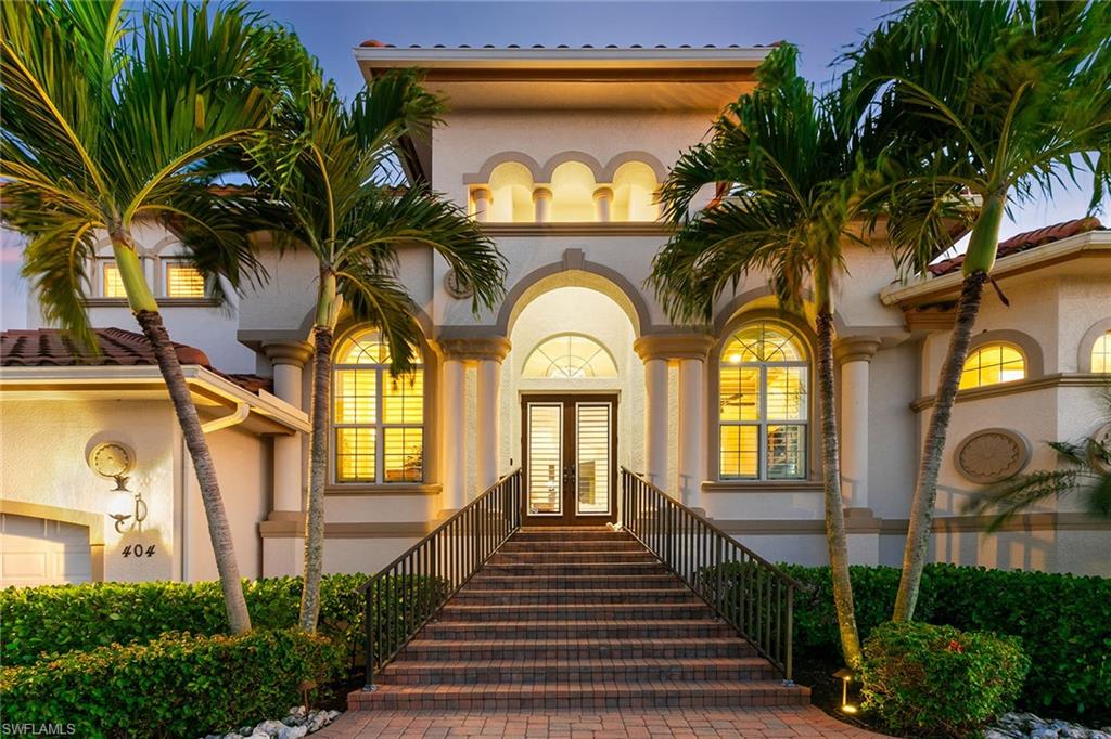Experience Naples waterfront living in this stunning Vanderbilt Connors estate, a boater's paradise on a prime canal-front lot with direct gulf access. Ideal for boating enthusiasts, this property features a 10,000-pound boat lift, jet ski lifts and a spacious split-level layout with an open floor plan. The primary suite and bonus office on the first floor offer privacy and convenience, while high-end craftsmanship, exquisite finishes, and open balconies blend indoor and outdoor living seamlessly. Relax by the bayfront saltwater pool, unwind on the screened lanai and view sunsets from the waterfront dock. With top-tier hurricane-resistant features and advanced security systems, this home has a history of resilience and peace of mind. Just moments from Naples’ beautiful Vanderbilt Beach, The Ritz-Carlton, and the exclusive shopping and restaurants of Mercato and only a short drive to downtown Naples famous 5th Avenue South. This residence encapsulates the best of luxury coastal living, complete with breathtaking canal views and seamless water access. Don’t miss your chance to own an extraordinary piece of Vanderbilt Connors real estate, where every day feels like a vacation.