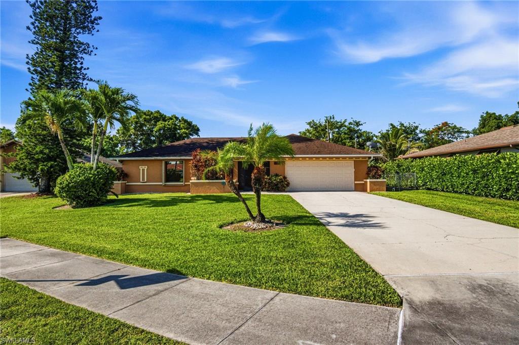 Beautifully updated Bonita Springs pool home only 3 miles from Bonita Beach! This 3-bedroom, 2-bath home features a bright split-bedroom floor plan, tile and lvp flooring throughout, an updated kitchen with newer countertops, white cabinetry, stainless appliances, and a convenient pass-through to the lanai for easy entertaining.
The spacious primary suite offers direct access to the screened lanai and heated pool, along with a walk-in closet, private vanity area, and walk-in shower. Guest bedrooms are generously sized.

Enjoy your own private outdoor retreat with a large heated pool, covered screened lanai, large fenced backyard, newer storage shed, and 2-car garage. Major updates include A/C replaced in 2022 and roof replaced in 2018. Best of all, there are no rental restrictions, making this an excellent full-time residence, seasonal getaway, or investment opportunity.

Fantastic Bonita Springs location near beaches, dining, shopping, parks, golf, and easy highway access. A hidden gem in the heart of town offering location, lifestyle, and flexibility.