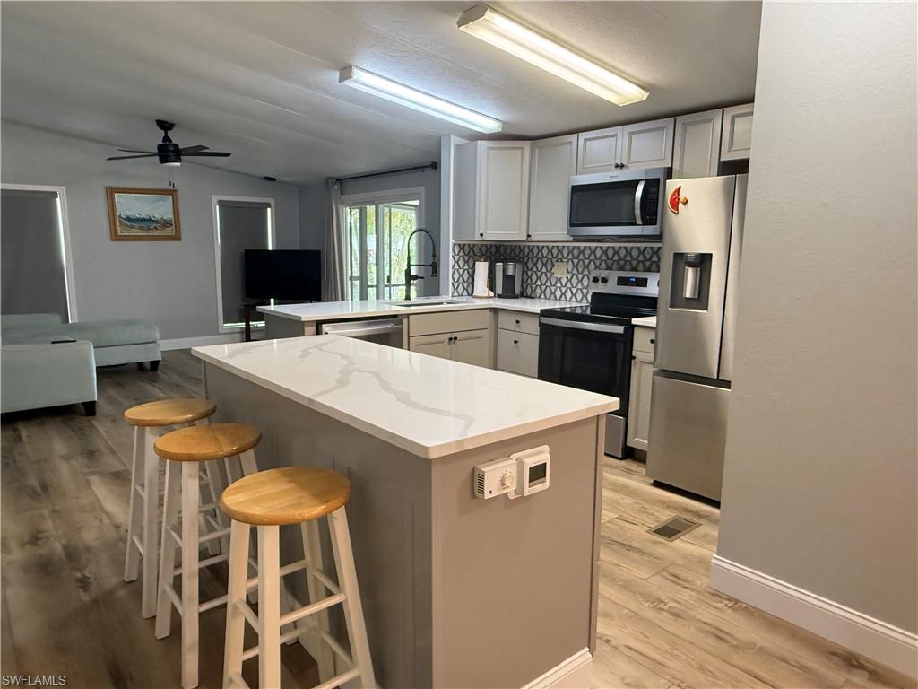 Welcome to 10251 Wales Loop in the highly desirable St. James Village, a vibrant 55+ active community in the heart of Bonita Springs. This beautifully maintained 3-bedroom, 2-bath manufactured home offers comfortable Florida living with numerous updates throughout.
The home features a modern, newly updated kitchen, an updated guest bathroom, all-new flooring, and a convenient inside laundry room. The spacious primary suite includes a private bath, offering the perfect opportunity for a new owner to add their personal touch, as it is the only room left to update. The exterior of the home is currently being freshly repainted, enhancing its curb appeal and value.
Residents of St. James Village enjoy an exceptional lifestyle with an impressive array of amenities, including a community pool and spa, a billiards room, bocce courts, shuffleboard, a library, a community clubhouse, and park-like gathering areas. Additional conveniences include boat storage, underground utilities, streetlights, and beautifully maintained grounds.
Nature lovers will appreciate the nearby preserve, perfect for walking, biking, and enjoying Southwest Florida's natural beauty. Located just minutes from Gulf beaches, shopping, dining, entertainment, and all that Bonita Springs has to offer, this home combines affordability, comfort, and an active lifestyle in one outstanding package.
Don't miss this opportunity to enjoy Florida living at its finest in one of Bonita Springs' most welcoming and amenity-rich communities.