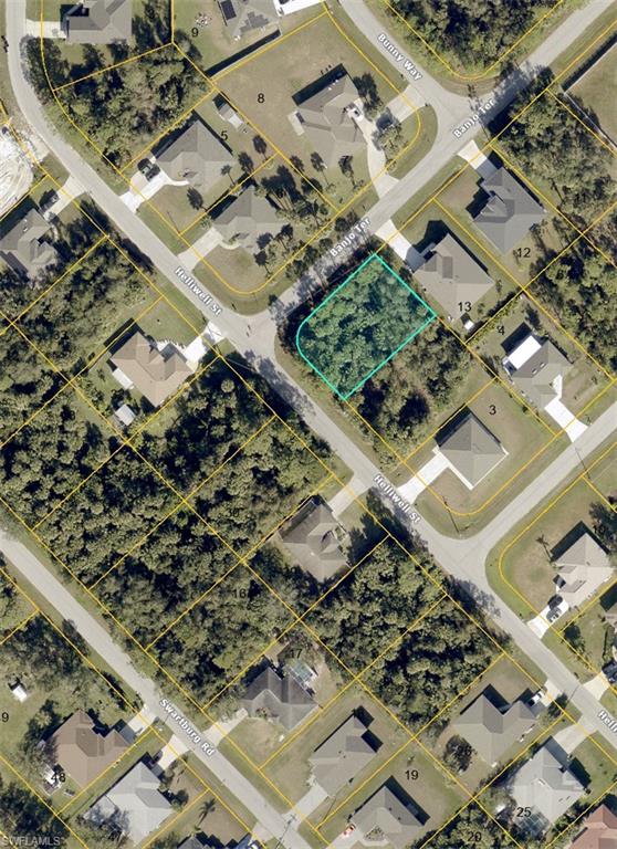 Beautiful corner lot offers a unique opportunity to build the home of your dreams, Situated in North Port a quiet and a quite developed area, this land boasts panoramic views with a convenient location close to local amenities. With ample space to design and build, this lot is perfect for those looking to create their own personal paradise. Don't miss the chance to turn this land into your HOME!!
