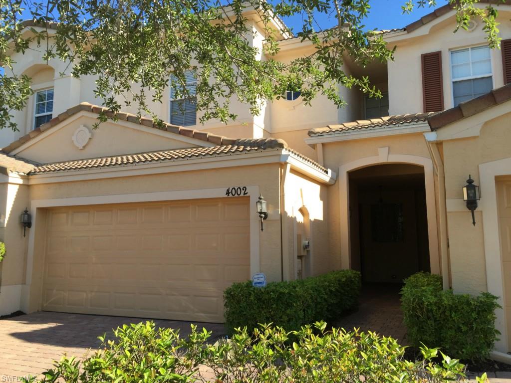 Beautiful gently lived in and exceptionally cared for San Simeon town home. Offering the best value in the community. Upgrades include custom marble entry floor, crown molding with gingerbread accents, extended brick pavers with preserve view. Largest unit available in community. Spacious master bedroom with walk-in closet and large master bath including jacuzzi garden tub and separate shower. Beautiful Preserve View from enclosed rear lanai. Community amenities include a resort-style pool, hot tub, fitness center and playground.  Quick close possible. Be settled before the season is in full swing. Community is minutes from shopping, restaurants, and I-75.
