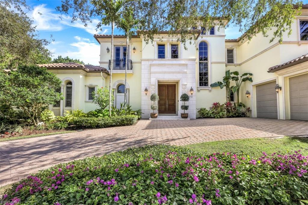 This luxurious and rarely available Bay Colony Shores residence – designed by renowned RG Design and built by prestigious Gulfshore Homes – is all about location, lifestyle and quality. Perfectly maintained with all new AC  the two-story estate home offers sunny southern exposure with expansive lake views and a resort-like pool and outdoor area.  Inside, you will find a great open flow of kitchen, dining area, living room and family room perfect for entertaining as well as day-to-day living with your family. A large island, Sub-Zero appliances and a walk-in wine room complement the kitchen. Conveniently located on the ground floor - along with two further large guest bedrooms - the spacious primary suite offers gorgeous views over the pool area. A beautiful staircase or the elevator take you to the second floor which features 3 more bedrooms and a large den with long views over the lake. Please note that some rooms are virtually staged. You will enjoy the first-class amenities Bay Colony offers exclusively to their residents. These include a full-service beach club on the Gulf, tennis club, concierge service program as well as optional membership at the Bay Colony Golf Club.