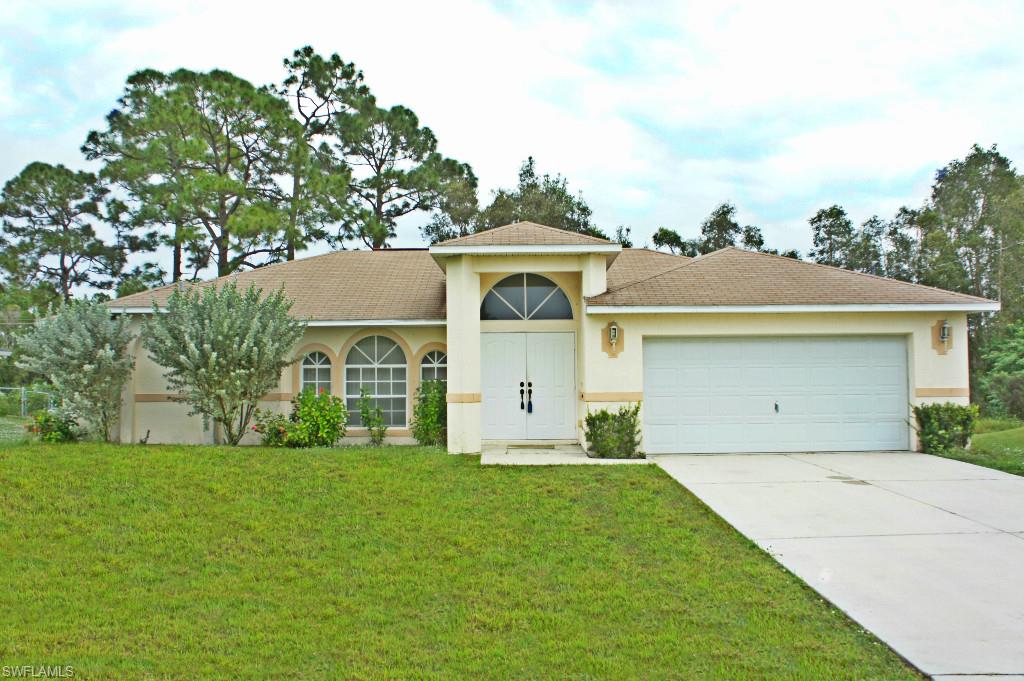 Check out this well maintained and move-in ready home! Double entry leads into a spacious vaulted ceiling great room, the entry is open and bright with multiple sliders that exit onto the screened lanai. The kitchen includes plenty of extra cabinet space with a large pantry, all appliances and breakfast bar. The split floor plan home features a master bedroom on one side and 2 large guest bedrooms on the other side of the home. The master bedroom has sliding doors onto the lanai, his & hers walk-in closets, master bath with dual sinks, private restroom and walk-in shower.  Come make this house your home today.