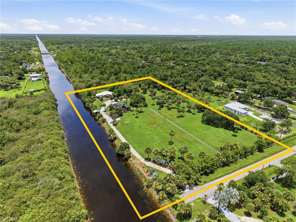 Rare 5.68-Acre Opportunity in Golden Gate Estates! This exceptional property offers endless possibilities with 5.68 acres of high and usable land in one of Naples’ most sought-after acreage communities. Whether you’re looking to create a private estate, expand your outdoor lifestyle, or invest in a property with room to grow, this unique offering delivers.

The rustic log cabin features 1 bedroom, 1 bathroom, and a loft, providing immediate use while you envision the property’s full potential. Existing improvements include a stable and horse run, adding flexibility for a variety of uses without defining the property’s possibilities.

Enjoy the privacy, space, and freedom of estate living, all while being just a short drive from Naples’ shopping, dining, schools, and Gulf beaches. A rare opportunity where the possibilities are as expansive as the land itself.
