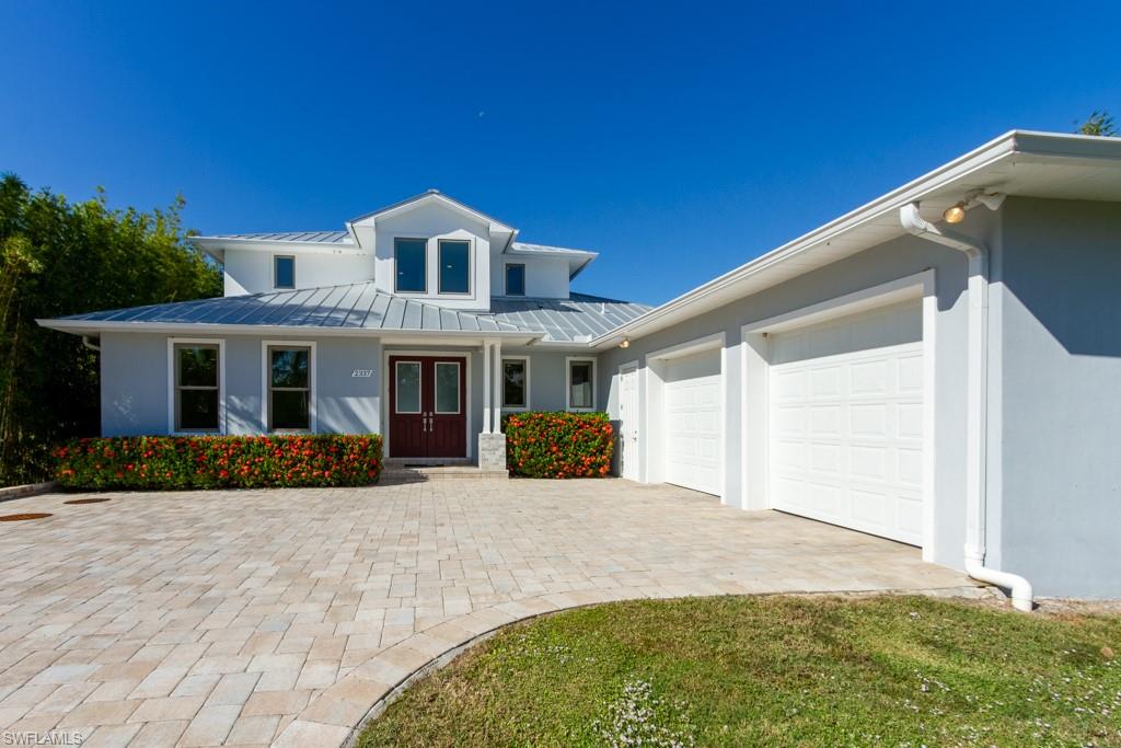 Live your dream life in this stunning custom built 2014, deep water direct gulf access home in the gated community of Sandpiper Point which is minutes away from Pine Island Sound & the Intercoastal waterway allowing for easy navigation to the  famous beaches of Sanibel, Captiva, Cayo Costa  & Boca Grande. Entertaining will be a breeze w/ this spacious open floor plan & gourmet kitchen, Ruffino custom solid wood cabinetry, granite countertops, Thermador gas cooktop & top of line Kitchen Aid stainless steel appliances. Master suite is located on the first floor & features large pocket sliders that open to the spacious lanai.  Pristine polished travertine tile throughout the first floor & hard wood throughout the second floor which features 2 ample guest bedrooms w/ sliders that open to a private spacious balcony. The rooftop balcony offers expansive views of the Gulf of Mexico, canals & preserve. Relax in the heated pool/spa. Enjoy boating & fishing w/ a 10K# covered boat lift w/ water and electric at the dock. House is constructed with Insulated Concrete Form (ICF), has all impact glass windows & doors. Too many amenities to list This is a Must See!