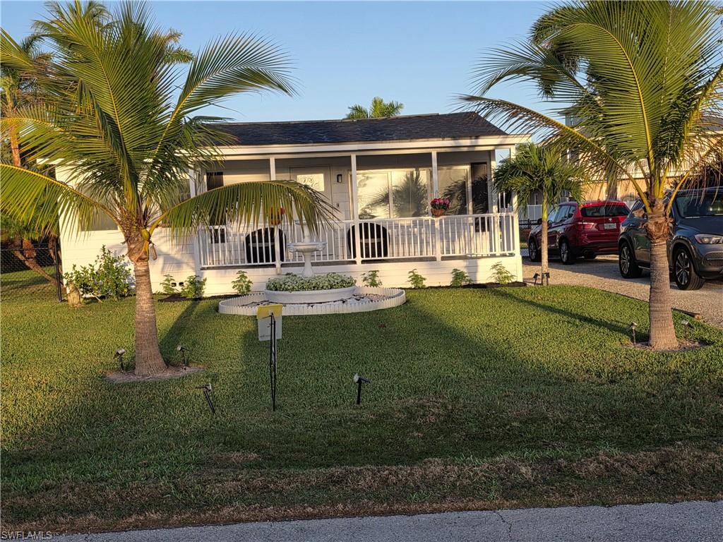 Own your home in Everglades City Island known for great fishing. River view property with oversized lot.  Sign up for a City Dock to Lease. Finance or Cash Deal.   Seller has a property survey, a four point inspection, and a wind mitigation report. Large patio with brick pavers. Backyard enclosed with galvanized black chain link fence, commercial grading four feet high with custom aluminum gates. All doors and windows impact. High rated impact windows for approximately 180 mile wind protection. New shingle roof installed March 2026. Outdoor aluminum shed with upper storage space able to fit lawn mover. Large front yard with plenty of front parking spaces for RV and boats. Central AC and heater. Whole house water filtration system. Reverse Osmosis system under kitchen sink. Open floor plan. Kitchen counter top quartz and hardwood cabinets with self closing drawers. Large kitchen island. Big laundry room includes washer and dryers, cabinet space, and large laundry sink. Porcelain tile floor throughout all the house. Property will be sold partially furnished. Large front porch. Enjoy your island style living or weekend get away. Enjoy great fishing. Great kitchen size, large bathroom, big bedrooms, and open living room. 

Alternative number to contact
239-352-0202