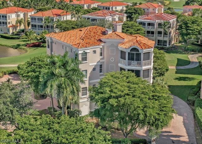 GORGEOUS HARBOUR LANDINGS CONDO IN THE EXCLUSIVE GULF HARBOUR YACHT & COUNTRY CLUB DEVELOPMENT. Only 3 Units per Building. Each Unit Spans Entire Floor with Access to Your Private Foyer from the Elevator. You'll Love the Golf Course View and Great Floor Plan with 2,257 Sq Ft of Living Area. The Chef & Entertainer will Appreciate the Huge Kitchen, Wood Cabinets, Many Pull-Outs, Stainless Steel Appliances, Ample Storage, and the Bar & Wine Cooler in the Family room. The Spacious Owner’s Suite includes Sitting Area, Beautiful Bath, his & her Sinks, Oversized Shower, Walk-in Closet with Built ins and a Safe. Additional Features Include: Tray Ceilings, Custom Lighting & Window Treatments, Hunter Douglas Blinds, Plantation Shutters, Hurricane Impact Windows, and Air Conditioned 2-car Garage. The Large Back Balcony & Front Balcony have Electric Hurricane Shutters. In 2009 Condo had a $200k Complete Renovation. Harbour Landings has its own Community Pool & Spa. Gulf Harbour Yacht & Country Club has a Private Golf Course, Deep Water Marina, Pool & Spa, Fitness Center & Spa, Tennis, Clubhouse, 2 Restaurants, Walking Paths & more. Near Beaches, Shopping, Dining, and RSW International Airport.