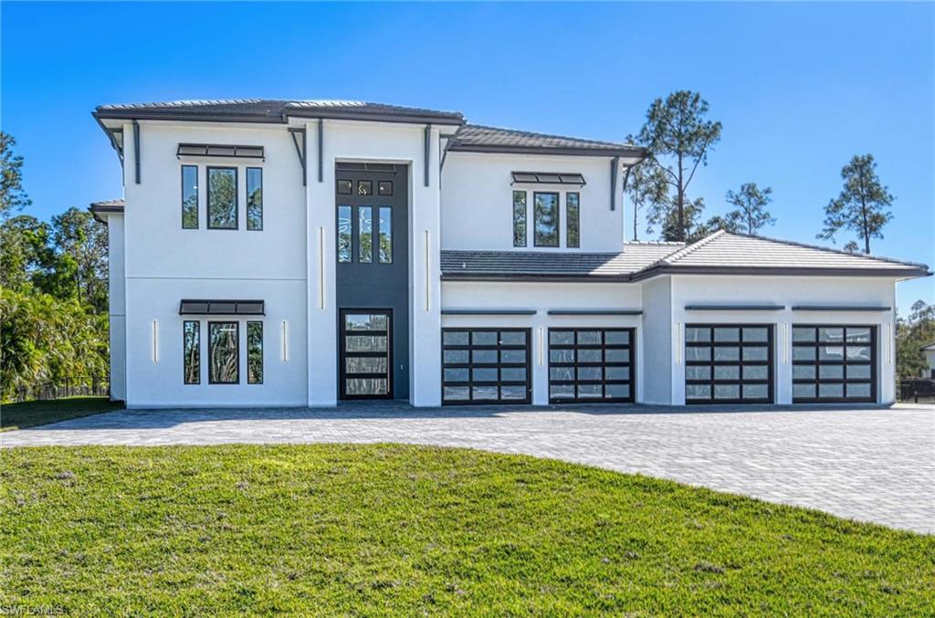 This breathtaking estate home is nestled on 3.17 pristine, gated, all-upland acres in Naples’ prestigious Logan Woods, showcasing quality built to the highest standards and uncompromising luxury throughout. Offering 8,099 square feet of living space, the grand two-story main residence boasts soaring high ceilings, a masterful architectural layout, and abundant natural light streaming in from all four directions. It features seven en suite bedrooms, eight full bathrooms, and two half baths, including a convenient pool bath. At its heart is a stunning double island kitchen, complemented by a luxurious steam room, a spectacular fully automated saltwater pool with fire and water features, an outdoor summer kitchen, a whole-house reverse osmosis system, and a whole house generator. The entire property enjoys whole-property irrigation. This private estate is fully fenced with an automatic gate and surrounded by lush privacy hedges. The main residence also includes a four-car garage.
A charming guest cottage, completely remodeled with a brand new roof and new appliances, sits at the front of the property with its own two-car garage.
This is truly one of Logan Woods’ finest offerings, with many more exceptional features and details throughout.