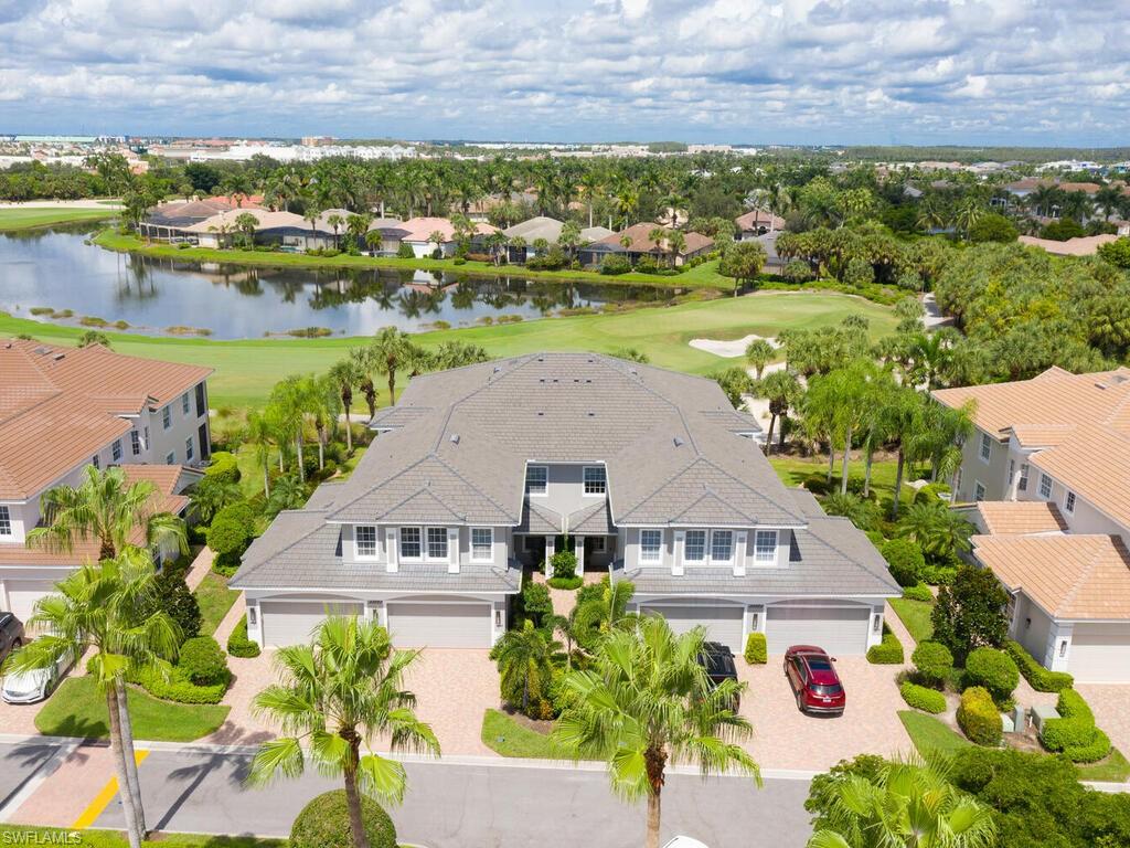 Experience refined living in this 2nd floor Bellavista condo in the award-winning #1 Community in the US - Miromar Lakes Beach & Golf Club! Upon entry, residents can choose the elegance of a rich wood staircase leading to the main living level or enjoy the ease of a private elevator.  The well designed kitchen features abundant counter & cabinet space, a walk-in pantry & a convenient center island.  With a breakfast bar, casual dining area in the kitchen & a separate dining room there is plenty of space for entertaining & daily living.  The living room showcases rich wood flooring that adds warmth & elegance.  Expansive windows & sliding glass doors frame the serene golf course views & extend the living area to a screened balcony - an inviting retreat for your morning coffee or unwinding in the evening with a glass of wine.  The spacious primary suite offers a cozy sitting area, large walk-in closet & separate closet.  The primary bath features dual sinks, soaking tub & separate shower.  A private guest bedroom with adjacent full bath ensures comfort for family or guests.  The versatile & spacious flex room provides endless options - bedroom, den, office, media room, man cave or hobby space & it conveniently has a full bath.  Additional feature includes an attached 2-car garage, offering convenience & peace of mind.  Residents of Bellavista can enjoy their own neighborhood clubhouse, complete with comfortable seating area, tv and small kitchen - perfect for casual gatherings.  Outside you will find a sparkling pool, spa & bbq grills for relaxed Florida living.  Beyond the Bellavista community residents enjoy the unparalleled lifestyle of Miromar Lakes:  three miles of private white-sand beach, 700 acres of freshwater lakes for boating & water sports, an Arthur Hills Signature Championship Golf Course, putting green, tennis, pickleball, bocce, 2 marina areas, full service spa & fitness center, resort style pool & spa, indoor/outdoor dining & bar areas & more. All of this is a short drive to RSW Intl Airport & extensive dining - entertainment & shopping options.  This is your opportunity to enjoy the elegance, amenities and exclusivity of this premier community!  Come be a part of the Miromar Lakes Beach & Golf Club lifestyle this season!