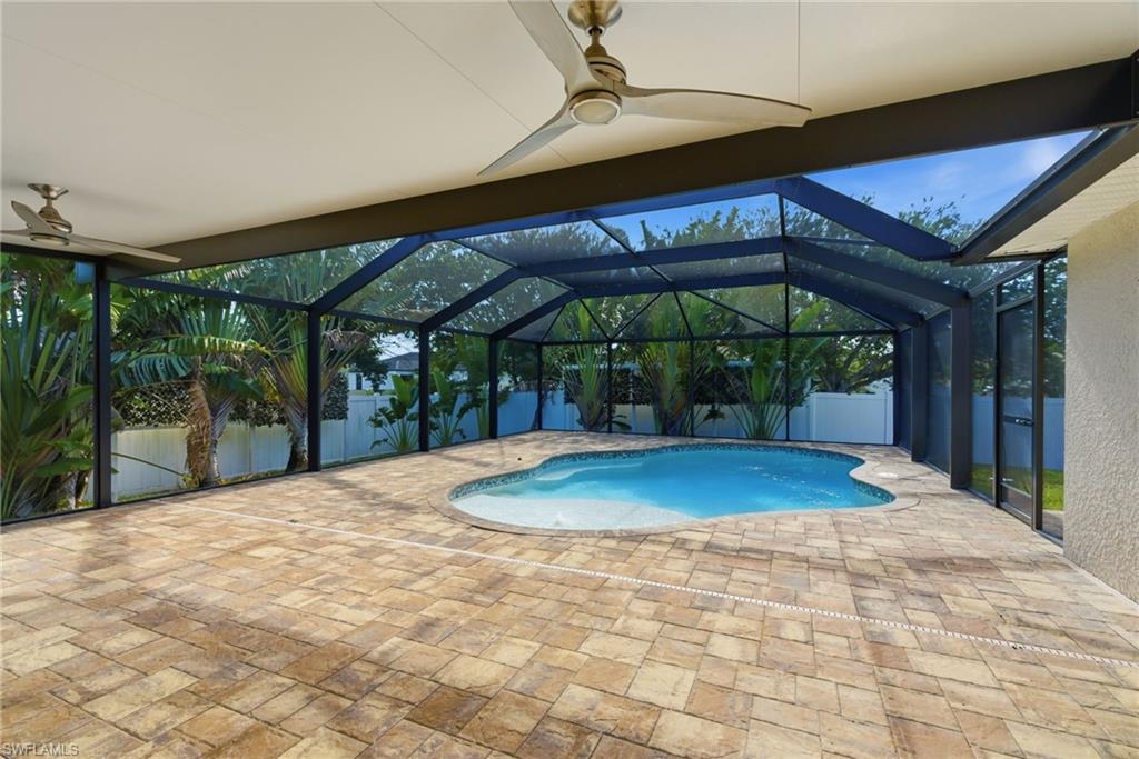 Welcome Home to 317 SW 25th Avenue, Cape Coral! This beautifully updated 3-bedroom, 2-bath heated pool home offers over 1,500 square feet of comfortable living space in one of Cape Coral's rapidly growing areas!
From the moment you arrive, you'll appreciate the thoughtful upgrades and pride of ownership throughout. This move-in-ready home features new flooring, gorgeous granite countertops, stainless steel appliances, and stylish plantation shutters in the living room and at the front door, creating a bright and inviting atmosphere. Step outside to your own private backyard oasis featuring a heated pool, newer fencing (2019), and beautifully enhanced landscaping that provides exceptional privacy and the perfect setting for entertaining or relaxing year-round.  Additional updates include: New Roof (2019), Hurricane-Impact Windows & Doors (2022), Electric roll-down shutter on the lanai (2022). New Fence (2019), Granite Countertops, Stainless Steel Appliances, Plantation Shutters, Heated Pool, Extensive Landscaping & Privacy Conveniently located near shopping, dining, entertainment, and everyday conveniences, you're approximately 25 minutes from Downtown Fort Myers, 25 minutes from Downtown Cape Coral and 25 minutes from Downtown Punta Gorda, placing you right in the heart of Southwest Florida's continued growth and development. Whether you're looking for a primary residence, seasonal retreat, or investment opportunity, this home checks all the boxes. Don't wait—homes with this combination of updates, privacy, and a heated pool don't stay on the market long. Schedule your private showing today! Welcome to your Florida lifestyle!  Did I mention one of the best features, it's NOT in a Flood Zone!!!