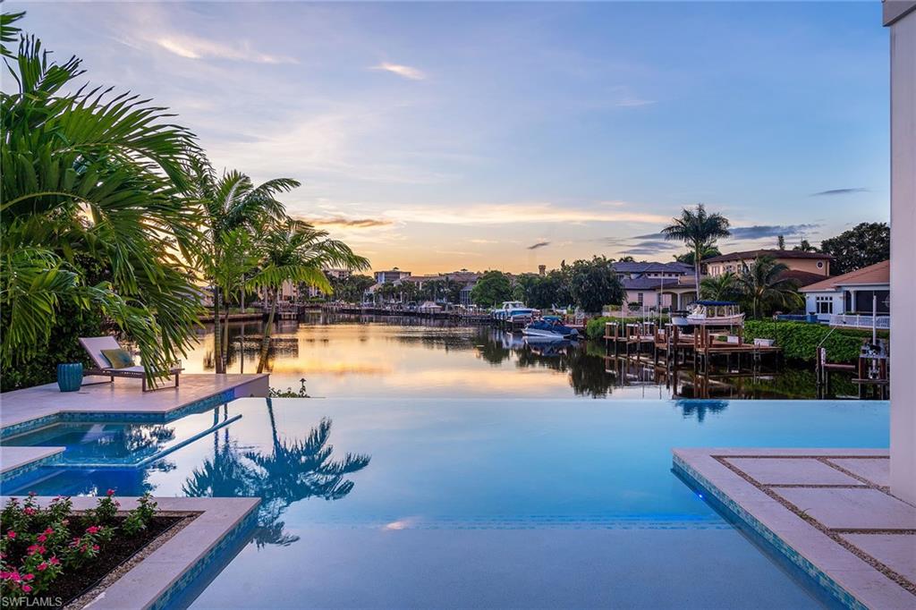 Tucked away on a quiet, hidden street in The Moorings, this newly built waterfront retreat is more than just a house—it's a lifestyle of serene elegance and effortless coastal living. Crafted by the acclaimed team at Toscana Homes, Stofft Cooney Architects, and Kipp Development.