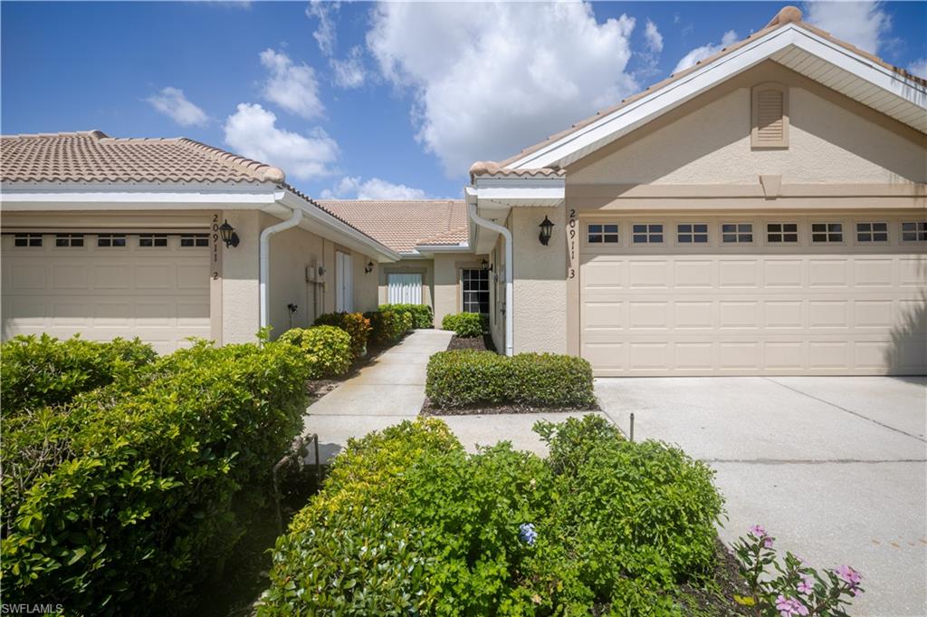 Welcome to 20911 Calle Cristal #3, a beautifully maintained 2-bedroom villa in the desirable Solana neighborhood of Herons Glen Golf & Country Club. Offered with furniture and a 2025 Grayson golf cart, this move-in-ready home makes it easy to begin enjoying the Florida lifestyle! The bright, open floor plan features a kitchen with Corian countertops and a breakfast bar overlooking the main living area. Step outside to the extended screened lanai and enjoy peaceful pond views surrounded by wildflowers and swaying palm trees. The spacious primary suite offers an oversized walk-in closet and private bath with walk-in shower and double vanity. The second bedroom is tucked away for privacy and also features a large walk-in closet. Major updates include a NEW ROOF IN 2025 with extra matching tiles on-site, 2024 water heater, 2022 appliances, and a 2018 TRANE A/C with new coils installed in 2025 and a 2-year warranty. Solana provides truly maintenance-free living with lawn care, landscaping, weeding, roof cleaning and internet/TV included. Herons Glen offers a 24-hour manned gate, top-rated golf course, on-site golf pro and golf shop, restaurant, ballroom, pickleball, tennis, bocce, resort-style pool and spa, fitness center, personal trainers, massage therapy and physical therapy services. This villa is ready to go—spend less time on upkeep and more time enjoying the Florida lifestyle!