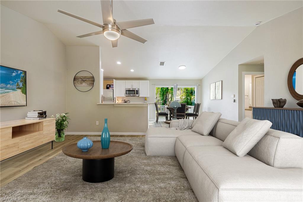 One or more photo(s) has been virtually staged, AI generated or rendered.  One or more photo(s) has been virtually staged, AI generated or rendered. LOCATION, LOCATION, LOCATION! Just a short walk to the Caloosahatchee River and only minutes from Downtown Fort Myers, this beautifully updated home offers modern living, incredible flexibility, and one of the best values in the area. Built in 2013, it is one of the newest homes in this established neighborhood and has been extensively upgraded throughout.
Inside, you'll find an open-concept floor plan with soaring vaulted ceilings, luxury vinyl plank flooring, abundant natural light, and a remodeled kitchen featuring quartz countertops, modern white cabinetry, stainless steel appliances, and a spacious breakfast bar overlooking the living area. The large living and dining space is ideal for entertaining and everyday living.
Both bedrooms are generously sized with walk-in closets and custom built-in cabinetry for added storage. The updated bathroom features a granite-top vanity, tub/shower combination, and a built-in Bluetooth speaker integrated into the exhaust fan. Additional improvements include fresh interior and exterior paint, updated lighting fixtures, modern ceiling fans, a full-size washer and dryer, and an energy-efficient A.O. Smith 66-gallon hybrid water heater. AC is serviced regularly for your peace of mind.

The oversized one-car garage is a rare and versatile feature, complete with a dedicated mini-split A/C system and ceiling-mounted Bluetooth speakers. Whether you're looking for a workshop, home gym, hobby space, or additional area for entertaining, this space offers endless possibilities.
Outside, the expansive backyard provides plenty of room to bring your vision to life. Enjoy mature mango and banana trees, newly planted Clusia privacy hedges, an outdoor fitness station, and ample space for a pool, boat, RV, trailer, or future additions. The neighborhood offers a welcoming atmosphere with neighbors who look out for one another while still respecting your privacy. With no HOA and no rental restrictions, you'll enjoy the flexibility and freedom that are becoming increasingly difficult to find. As an added bonus, chickens and ducks are permitted, giving you even more options for creating your ideal Florida lifestyle.

Conveniently located near public boat ramps, marinas, waterfront parks, fishing, dining, and the vibrant River District, you'll have easy access to local restaurants, live entertainment, shopping, community events, and everything that makes Southwest Florida living so desirable. Whether you're looking for a primary residence, seasonal getaway, investment property, or retirement home, this move-in-ready property offers an unbeatable combination of location, upgrades, and lifestyle.