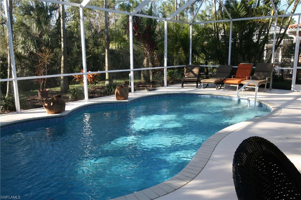 This beautiful immaculate and contemporary IBIS home shows like a model. Very well decorated. TOMMY BAHAMA furniture. The den provides 2 sleeper convertible chairs for guests. TURNKEY! Yes, all furnishings, decorator items, and much more are included. Just bring your bathing suit and enjoy the gorgeous pool (can be heated electric) with the privacy this view offers watching Florida nature right out your back door. Stainless steel appliances in the kitchen and washer are replaced in 2 0 1 7 !!
The pool deck will be freshly painted. The garage is painted with EPOXY. Very durable! Herons Glen - a gated golf and tennis community in North Fort Myers. The residents own all the facilities.