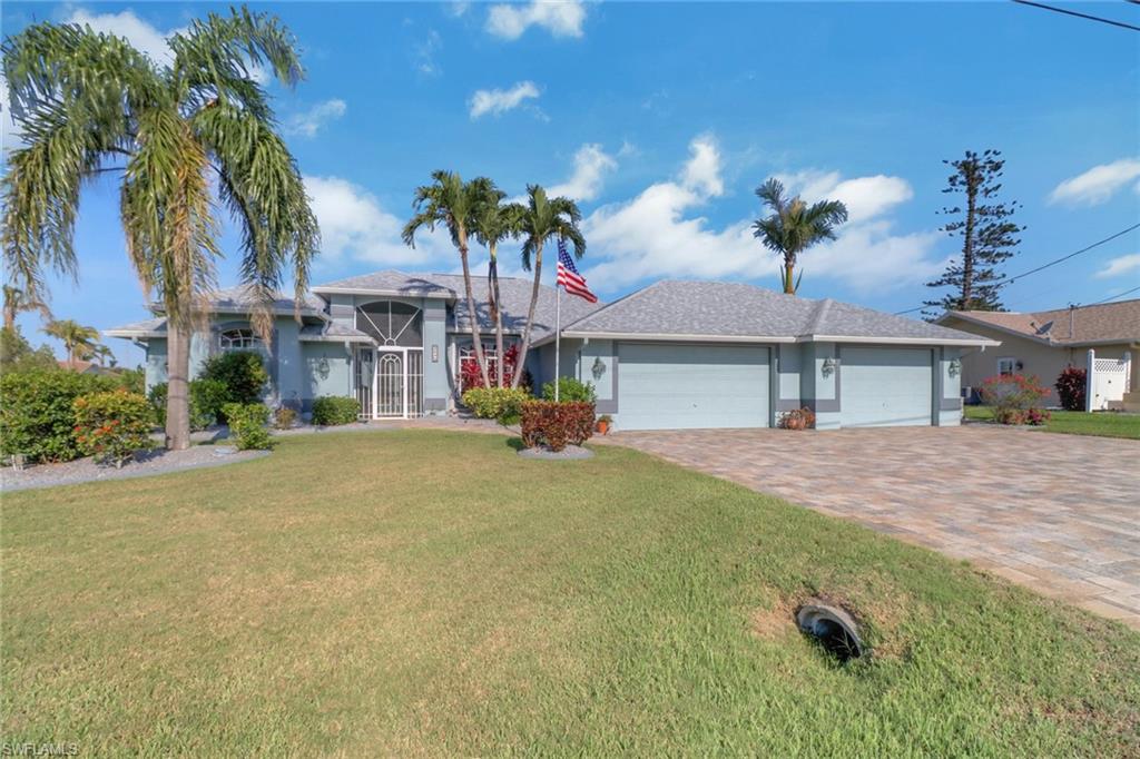 Welcome to this exceptional Gulf Access waterfront home situated on an oversized 0.36-acre homesite with all assessments paid. Offering 2,293 square feet of thoughtfully designed living space, with 3 bedrooms, 2.5 bathrooms, and an open-concept floor plan ideal for both everyday living and entertaining.  The spacious kitchen is a chef’s delight, showcasing updated granite countertops, a stylish backsplash, abundant cabinetry, and plenty of workspace. The generously sized bedrooms provide comfort and privacy, with ample closet space throughout.  Recent upgrades offer peace of mind, including a new roof (2020), new A/C system (2023), whole-house generator (2020).  The solar-heated pool allows for year-round enjoyment while helping reduce energy costs.  Outdoor living takes center stage with an expansive screened lanai and pool area complete with a convenient pool bath—perfect for hosting family and friends. Boating enthusiasts will appreciate the 10,000-pound boat lift and direct Gulf access, providing endless opportunities to explore the beautiful waterways of Southwest Florida.  The oversized, fully fenced yard offers added privacy and security while creating the perfect space for pets and outdoor activities. A spacious 3-car garage provides ample room for vehicles, storage, and hobbies. Additionally, the air-conditioned man cave offers incredible flexibility and could easily be transformed into a home office, fitness room, guest suite, or mother-in-law quarters.  Don’t miss this opportunity to own your own slice of paradise in Cape Coral.