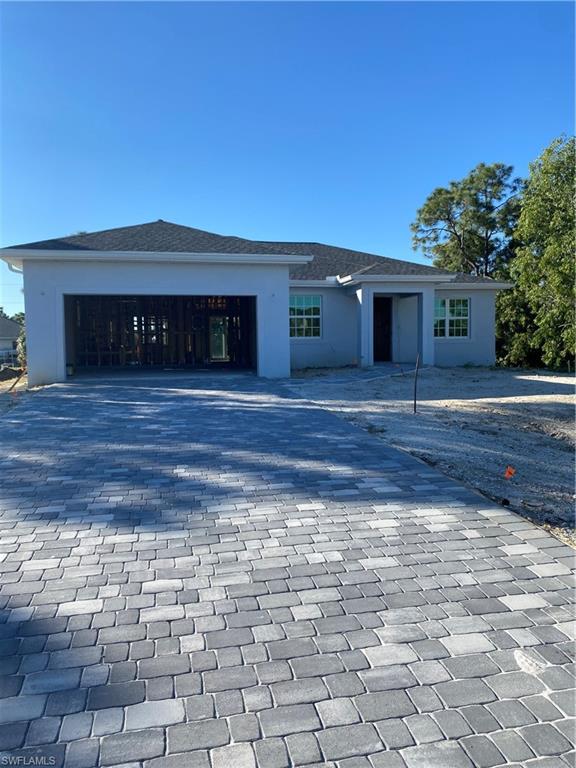 Brand new construction pool home with 3 bedrooms, a den, and 2 full bathrooms. Stunning finishes throughout this home include granite counters, 24x24 floor tiles, caged pool, high ceilings, and a paver driveway. All windows and doors are impact resistant, and home boasts tons of natural light! Great location in an up and coming area of NW Cape Coral. Building plans and pool sketch available upon request. This home is currently under construction, and is anticipated to be completed by the end of January. Finished photos are from a different property by the same builder. Used for reference only. 

Other locations are available to build from scratch on as well.