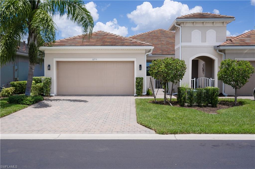Welcome to Tidewater of Estero – Where you will find your very own Private Oasis!
 In addition to the photos click on the 3 D tour of the residence 
This wonderfully maintained attached villa offers the perfect blend of luxury, comfort, and low-maintenance living. Featuring a private heated pool, this Pulte-built 2020 home delivers just under 1,600 sq. ft. of air-conditioned space with 2 bedrooms + a den, 2 baths, and a 2-car garage.
Step inside the foyer to an inviting open-concept floor plan with a fluid layout that’s ideal for both everyday living and entertaining. The main living areas and den showcase elegant tile flooring, while the primary and guest bedrooms feature durable luxury vinyl plank. The chef-friendly kitchen is a standout with quartz countertops, stainless steel appliances, a stylish backsplash, and gas cooking. Custom ceiling fans throughout add the perfect finishing touch.
Notable features include:
•  Spacious primary en-suite with dual vanities and a large walk-in closet featuring custom built-in cabinetry
•   Epoxy-finished garage floor
•  Paver driveway and pool area
•  Durable tile roof
Best of all: No CDD, no flood insurance required, and very reasonable HOA fees.

Residents enjoy a first-class amenity center complete with a full-time Activities Director. Stay active with pickleball, tennis, bocce, and a well-equipped fitness center. Unwind at the resort-style pool with lap lanes and hot tub, or enjoy the community library and dedicated dog park.
Located in the heart of Estero, you’re just minutes from Miromar Outlets, Coconut Point Mall, and Hertz Arena. Easy access to SWFL International Airport (RSW) and Southwest Florida’s world-class beaches.
This is more than a home — it’s an exceptional lifestyle opportunity in one of Estero’s most desirable communities. Don’t miss your chance to make this villa yours!