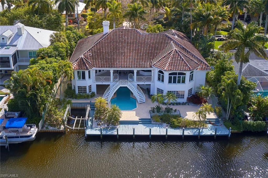 This home underwent a total renovation on the upper level in 2013-2014 with top-of-the-line finishes, yet has not had anyone using it so it is virtually BRAND NEW. The kitchen has Thermador appliances along with quartz counters and beautiful mother-of-pearl tiles that shimmer on the backsplash in the sunlight. 7" wide plank French Oak floors were laid throughout the home on the main level with 8" baseboards and 4" casings. The vaulted ceilings boast poplar beams as well as cypress beams in the master bedroom and open balcony. 8' solid wood doors were added throughout the home. All the bathrooms were finished with Carrara marble, Baldwin hardware and the master bathroom boasts a freestanding rectangular tub. As one enters the living room, one will see the beautiful floor-to-ceiling gas fireplace that will make the open rooms feel cozy and friendly when lit. The non-conforming space below has a recreation room with a kitchenette, a guest bedroom and 1 and 1/2 baths. There is abundant storage on the lower level as well as a 3-car garage. There is a space for an elevator should the buyer want to add one. Home is being sold "AS-IS".