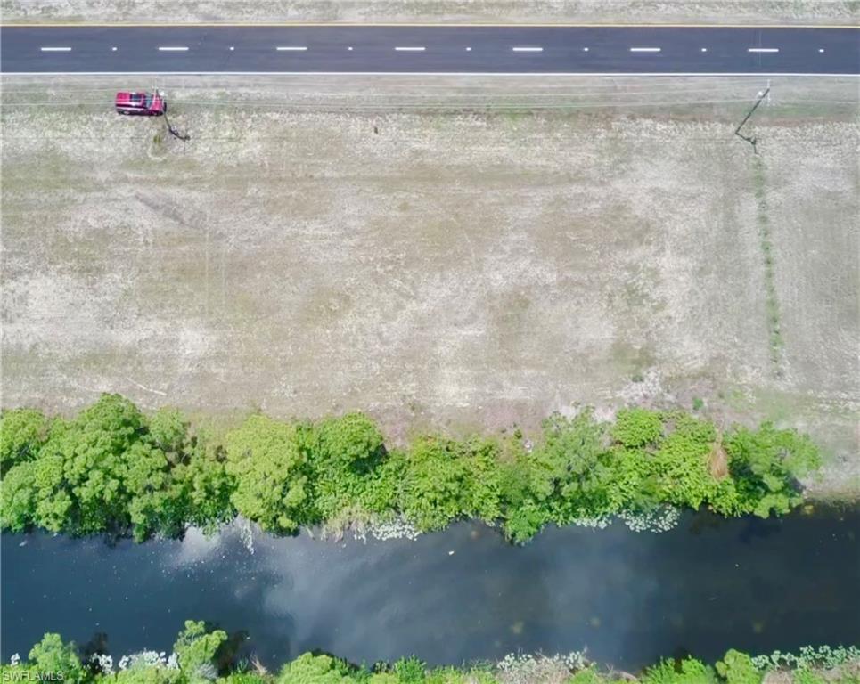 Your new home site awaits with plenty of space on this TRIPLE lot. Surrounded by new construction homes and located on a newly paved road. Build your dream home across the canal from the Babcock Preserve! NO Neighbors behind you so this gorgeous old Florida canal is yours to fish, kayak and canoe.