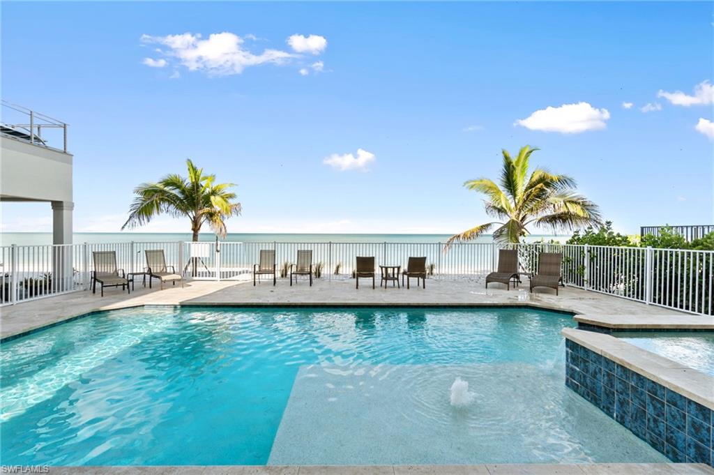 SPECTACULAR DIRECT BEACHFRONT, POOL HOME AVAILABLE ON BONITA BEACH! Fantastic rental opportunity with an estimated potential rental income of nearly $500k per year (optional) & NO RENTAL RESTRICTIONS! Currently over 170k of rental income over the next 7 months. This spacious & bright home is an entertainer’s dream with a fantastic open floor plan, 4 beds + office, 4 baths, dual laundry rooms located on the main level and upper level, and a pool/spa with a tanning shelf and water feature. Enjoy easy access to the beach, while also having a RARE fenced-in backyard that is perfect for pets or extra privacy! Fully pocketing sliders on the main level allow for seamless indoor/outdoor beachfront living. The expansive primary bedroom features a private balcony to enjoy spectacular sunsets, elegant tray ceilings, and an office with a wet bar, beverage cooler, and wine fridge. The spa-like primary bathroom offers an expansive walk-in shower, deep jacuzzi tub & dual-vanities. The open kitchen boasts professional grade appliances, granite counters & incredible Gulf views. Other features include a private elevator, 2018 roof, and 2021 HVAC. This perfectly located home is ready for you to add your touch to make it your perfect dream home on the beach. Close to several fantastic restaurants and only a 10-minute drive to Mercato and the Promenade, with Waterside Shops, Coconut Point, Naples 5th Ave, and the International Airport nearby. Enjoy the best of the best; all overlooking the stunning Gulf of Mexico.