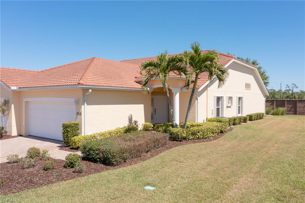 Absolutely immaculate 3 bedroom 2 bath, 2 car garage home in Villa Grande in Burnt Store Isles.  This lovely villa boasts cathedral ceilings, clean lines and a light color palette. For your comfort there is 2020 Rudd A/C. Hurricane shutters for windows, sliders and front door. Plus an Aprilaire media air clean purifier for your health! The great room with dining area is an open plan with sliders to the lanai. The eat-in kitchen includes hard surface counters, tall cabinets, 2022 Whirlpool refrigerator, updated Moen faucets and a large closet pantry. You will love the spacious owner’s bedroom, big walk-in closet and en-suite bath. The bath has tall ceilings with lots of natural light, split vanities and a large, tiled shower. The middle bedroom will make a comfortable den, office, exercise or music room. Guest bath and front guest room are ready for your family or friends. Relax on your private screened lanai with your morning coffee or evening drink. There is room to expand your lanai.   Walk to the golf course, grocery, hair and nail salon, restaurants and pet store. Only a few minutes drive to quaint downtown shoppes.