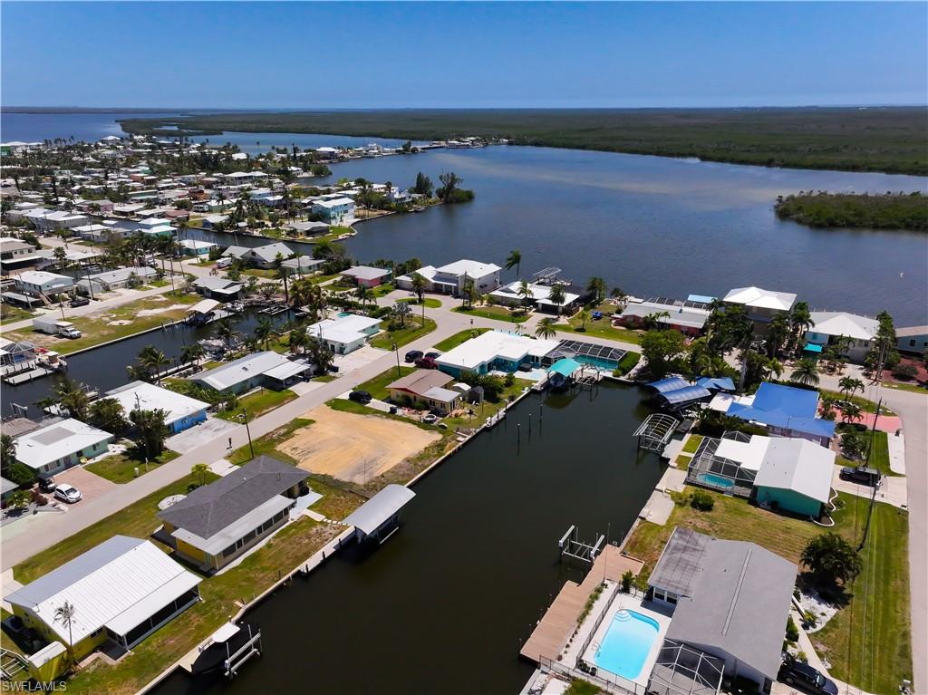 Welcome to the beautiful island gem of Matlacha! This slice of paradise is one of a kind-- 75FT. of waterfront frontage, DIRECT GULF ACCESS, cleared and ready for a custom build. Enjoy cool breezes, vibrant sunsets, tons of wild life and just a few paddle strokes out to open water. Walking distance to boutique shops, the iconic Blue Dog restaurant, Matlacha park, and art walk! Your new friends in this active, fun-loving community are waiting for you! Don't wait-- snag this piece of island heaven while you still can!