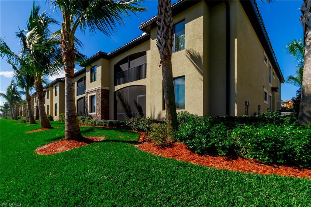 Visualize yourself in this 2 Bedroom + Den, 2 Bathroom end unit condo in a luxurious community with a beautiful lake view! Spanning over 1500 sqft, this beautiful residence showcases open living spaces with a lanai for gazing at the trimmed landscaping of Bonita National Golf course with tranquil waters of the lake just outside your door. 
 
The entryway of this 1st-floor condo draws you into a voluminous living area made for entertaining. Enjoy gatherings in the generously-sized living/dining area graced by tiled floors and glass sliders that lead out to the lanai. The kitchen offers granite counter tops and wood cabinetry with plenty of storage. The master bedroom has its own private bath plus a huge walk-in closet. 
 
This home is ideally positioned to enjoy summers in Bonita Springs FL. The spacious clubhouse will cater to epicurean dining and society affairs. A large state-of-the-art fitness center, tennis courts, and a resort-style pool & spa. The course boasts an amazing aqua driving range and golf pro-shop. Relax under the sun and enjoy the pristine waters and beaches on the Gulf of Mexico which is just minutes away from your home.