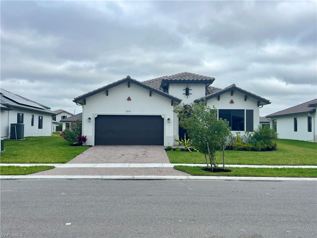 *** SHORT SALE *** Welcome to 5252 Lamone Lane, a beautifully maintained newer-construction home in Ave Maria’s DESIRABLE MAPLE RIDGE COMMUNITY. BUILT IN 2024 and set on a GENEROUS 0.24-ACRE LOT, this spacious residence offers 2,256 SQFT of living space with 3 BR+DEN/2.5 BA, and a bright, open layout designed for comfortable everyday living and entertaining.

Inside, the home features TILE FLOORING THROUGHOUT THE MAIN LIVING AREAS, carpet in the bedrooms and den, IMPACT WINDOWS & DOORS, UPGRADED QUARTZ COUNTERTOPS, MODERN APPLIANCES, WINDOW COVERINGS, LIGHTS FIXTURES, and CEILING FANS. The kitchen offers a clean, modern look with ample workspace and a seamless connection to the main living and dining areas. The spacious primary suite includes a VERY LARGE WALK-IN CLOSET and a WELL-APPOINTED EN-SUITE BATHROOM. The den provides FLEXIBLE SPACE FOR AN OFFICE, HOBBY ROOM, BEDROOM OR ADDITIONAL SITTING AREA.

This home has been VERY WELL TAKEN CARE OF and offers a WONDERFUL OPPORTUNITY to purchase a newer home in Maple Ridge. This is a SHORT SALE and is subject to lender approval.

Residents of Maple Ridge enjoy ACCESS TO THE MAPLE RIDGE CLUBHOUSE  with RESORT-STYLE POOL, FITNESS CENTER, SOCIAL SPACES, and more. Ave Maria offers nearby shopping, dining, parks, recreational paths, sports courts, community events, and Ave Maria University.

Ave Maria: where community meets paradise.