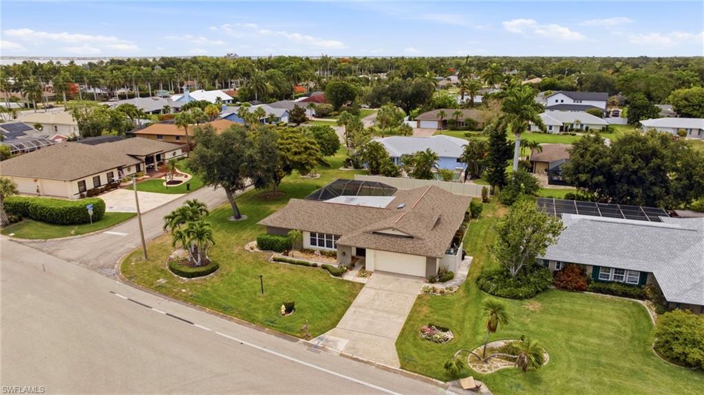 Located in the highly desirable Whiskey Creek community off of McGregor Blvd, this lovingly maintained 4-bedroom, 2-bath pool home sits on an oversized corner lot and has been cared for by the same owner since 1989. The home has never flooded! Offering a blend of charm, functionality, and peace of mind, this home features impact windows, a new electrical panel, and a roof replaced in 2019. Inside, you’ll find spacious living areas filled with natural light, while the outdoor space offers the perfect setting to relax, entertain, or enjoy the Florida lifestyle by the pool. The oversized corner lot provides added privacy, mature landscaping, and extra room to spread out. Conveniently located with multiple access points throughout town, this home makes commuting and daily errands effortless. Enjoy being just 5 miles from Downtown Fort Myers, 11 miles from Fort Myers Beach, 15 miles from Sanibel Island, 17 miles from Southwest Florida International Airport, and 15 miles from FGCU. Plus, you’re only minutes from grocery stores, shopping, dining, entertainment, and some of Southwest Florida’s best restaurants. CHECK OUT THE 3D TOUR & VIDEO TOUR ON LINKS PROVIDED!!