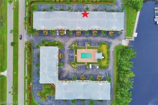 This beautiful unit is located in the Estuary at Everglades City in the heart of Historic Everglades City on a beautiful waterfront site.  The building was constructed in 2007 and is a solid all-concrete structure with a metal roof, complete with hurricane-impact windows and doors for peace of mind.  Partially furnished.  This unit includes a large two-car garage with plenty of space for your vehicles, boats and golf cart. Amenities include a heated pool and a private on-site boat ramp with dock, just a few yards away from the garage.  Enjoy quick access to the Ten Thousand Islands and the Gulf of Mexico for world-class fishing and boating.

Unit 110 is two bedrooms and two full baths with a large screened balcony with a view of the pool and Lake Placid.  The unit also includes full kitchen, dining area and in-unit laundry.  The kitchen appliances are less than five years old and the central a/c unit is less than two years old.

Located in the heart of the Everglades 10,000 Island National Park, the fishing is outstanding. Redfish, snook and tarpon are abundant.  For golfers, Naples is just a 30 minute drive. Kayaking the extensive mangrove islands and creeks is a great way to birdwatch and get up close to dolphins and manatees. Airboat and nature tours just a few blocks away.  After a day of outdoor activities take a dip the private heated swimming pool.