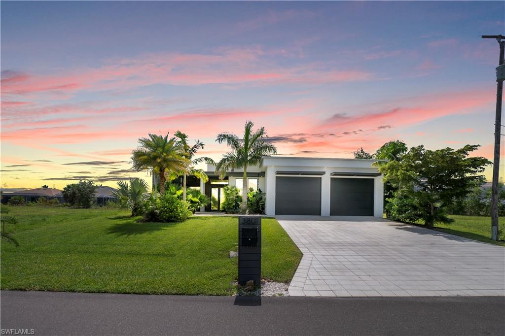 Welcome to your own private resort style Home  in desirable Cape Coral —  Property Received a LETTER OF MAP AMENDMENT BY FEMA (LOMA) ABOVE THE BASE FLOOD ELEVATION, stunning 4 bedroom + den, 3 full bath estate offering gulf access canal and no flood zone designation. This resort-style retreat is anchored by a show-stopping infinity pool and travertine paved pool deck, framed by impact-rated windows and doors. Built for performance and peace of mind, the home features a flat TPO roof (industrial grade) with sprayed foam insulation throughout, plus 3/4 polyurethane wall insulation — backed by Green Energy Certification. Oversized 10’ x 10’ garage doors with top-of-the-line motors offer exceptional convenience, while whole-house surge power protection, oversized industrial-grade gutters, dual A/C systems, carbon self-cleaning water filtration, and a chef-caliber Italian kitchen with stainless steel KitchenAid appliances, spacious eat-in kitchen area. Additional highlights include built-in closets and generously sized walk-in closets, providing ample storage throughout the home
complete this rare offering. Luxury resort living meets engineered excellence — schedule your private showing today.