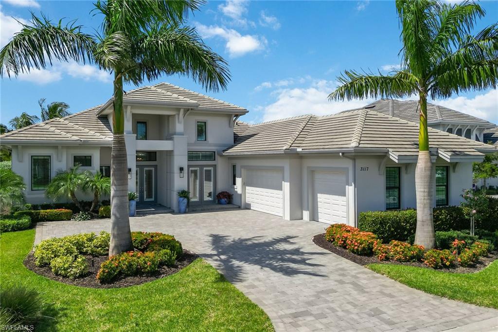 Rare opportunity to join the Members Club at The Rookery with this home. The buyer of this residence can avoid the long waiting list and become a member immediately. Membership amenities include access to 2 highly-regarded golf courses, 2 clubhouses and beach access at the JW Marriott. Exuding effortless style and class, this impeccable residence in the exclusive Fiddler’s Creek Marsh Cove community offers 4 bedrooms, 4.5 baths, study, and 3-car garage. This impressive Stock-built home is perfect for entertaining with a great room and expansive outdoor living with pocketing sliders bringing the outside in. The kitchen has white cabinets, island, walk-in pantry, stainless appliances including gas cooktop and wall oven. The luxurious master suite is fitted with two walk-in closets and 5-piece en suite with soaking tub. All guest bedrooms include 3-piece en suites. Enjoy beautiful golf course views on the lanai with outdoor kitchen and heated pool and spa. Noteworthy offers include an AC pool storage room, designer lighting, impact glass and a whole-home generator. Premium perks include access to a full-service spa, sauna, dining, fitness, tennis, pickleball, bocce and more.