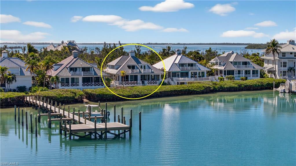 Water Wings cottage is waterfront, two-stories with Master on the first floor. The open first floor plan allows water views from the kitchen and living/dining areas which open onto a covered/screened porch and an open deck. The second floor features a loft-guest bedroom with bath, and a water view balcony. Both the interior and exterior have been renovated to  first class quality. Exterior is Hardi Board, roofing is aluminum and decks are wood. Naturally the construction meets all windstorm resistance codes as the developer is a well-known contractor that has completed numerous high quality homes and renovations on the island over the past 20 years. Interior finishes include granite or marble counters, quality cabinetry and appliances. The entrance to the home is from a driveway of stone pavers and a thoughtfully landscaped yard. There is a shared storage room, a new propane generator and a 500-gallon propane tank. In addition to these fine features, Village owners recently were treated to significant road improvement of layered gravel, and heavily landscaped with mature palms of all types, creating a beautiful, tropical boulevard access. Recently completed multi-family dockage is just steps away and accommodates boats up to 24’. 

This home is located in the Useppa Village neighborhood on the western shore of the reimagined and redeveloped, private Useppa Island. Featuring the Useppa Island Club and Marina, Useppa Village owners enjoy all the services and amenities of a small town. Useppa is a bridgeless island ensuring privacy and solitude. Yet, there is an active lifestyle of boating and sporting activities for any that wish to participate. The island is known for its outgoing community of residents, and with only 118 homes, the nature of the island will not deviate from the tropical luxury and Old Florida ambiance that create this special place in the sun.