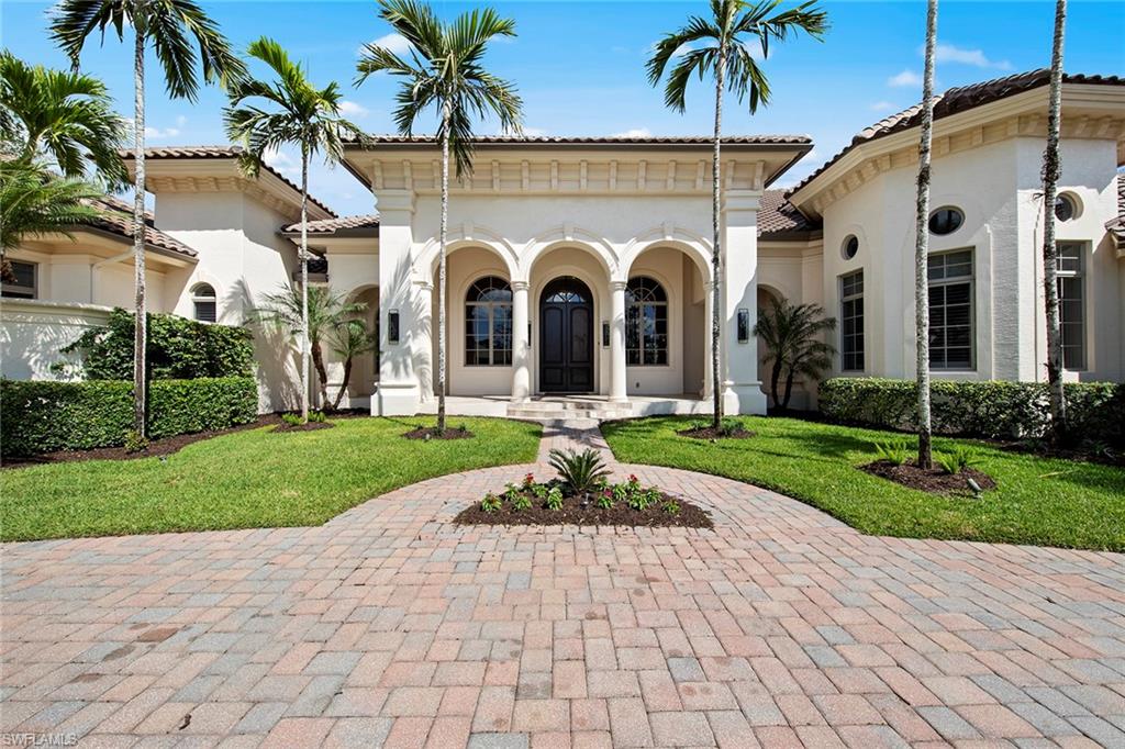 New pricing on an exceptional home and an unbeatable value in the desirable community Quail West. This exquisite home welcomes you with a grand entry leading to an elegant formal living room, featuring soaring ceilings and a marble fireplace. Adjacent is a sophisticated dining room, ideal for hosting special occasions. Designed with entertainment in mind, the gourmet kitchen is equipped with top-of-the-line Wolf and Sub-Zero appliances, complemented by an expansive island with a breakfast bar and a wet bar. The great room, with its striking tongue-and-groove accents, flows effortlessly through zero-corner sliders to the extended lanai, where breathtaking views of the golf course and surrounding preserve offer unparalleled privacy. The oversized pool, extended seating area, and outdoor kitchen create an ideal space for relaxation and gatherings. A well-appointed den opens to the large covered outdoor screened-in lanai, further enhancing the home’s flow and functionality. The primary suite is a luxurious retreat, featuring a spacious bath with dual showerheads, dual walk-in closets, and a private breakfast bar for leisurely mornings. The home offers three generously sized guest bedrooms, each with its en-suite bath, two on the main floor and one on the second level, complete with a balcony, breakfast bar and private elevator for convenient access. Recently updated with fresh interior and exterior paint, this home also boasts a four-car garage, a newer roof, Lutron, a whole-house generator and updated HVAC systems. Residents enjoy exceptional amenities of the exclusive Quail West Country Club, offering world-class facilities to cater to every need. Seller will consider attractive four-year owner financing at 5% interest, below market rates. Inquire for details.