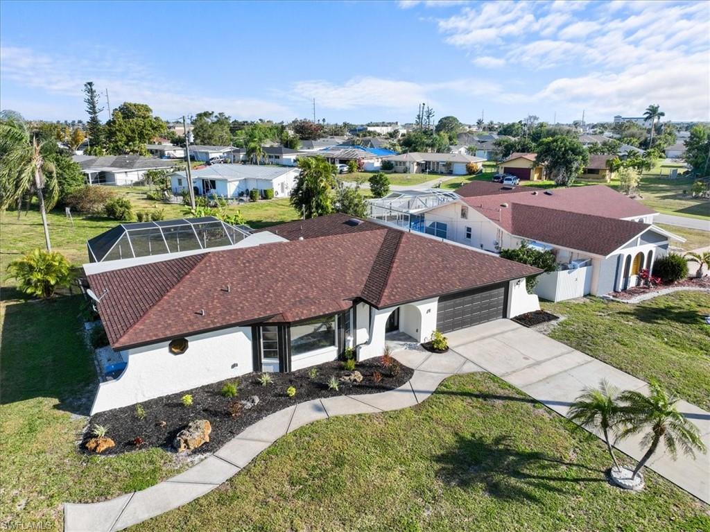 POOL HOME — SOUTHERN EXPOSURE — NO FLOOD INSURANCE REQUIRED — ALL ASSESSMENTS PAID!
Welcome to the Cape Coral home near Downtown. This beautifully updated 3 bedroom, 2 bath heated pool home offers the perfect blend of comfort, style, and location. With desirable southern exposure, you can enjoy bright natural light throughout the day and relaxing poolside living in your own private backyard paradise.
Step inside to a bright, open layout designed for everyday living and entertaining. The split bedroom floor plan offers privacy and functionality, making it ideal for families, guests, or anyone looking for extra space. This home features tile flooring throughout, a newly updated kitchen, remodeled bathrooms, fresh interior and exterior paint, a newly resurfaced pool, a new pool heater, and a roof replaced in 2022.
Perfectly located in the heart of Cape Coral, you are just minutes from downtown restaurants, coffee shops, shopping, entertainment, and local favorites. Best of all, this home is truly move in ready with all assessments paid and no flood insurance required.