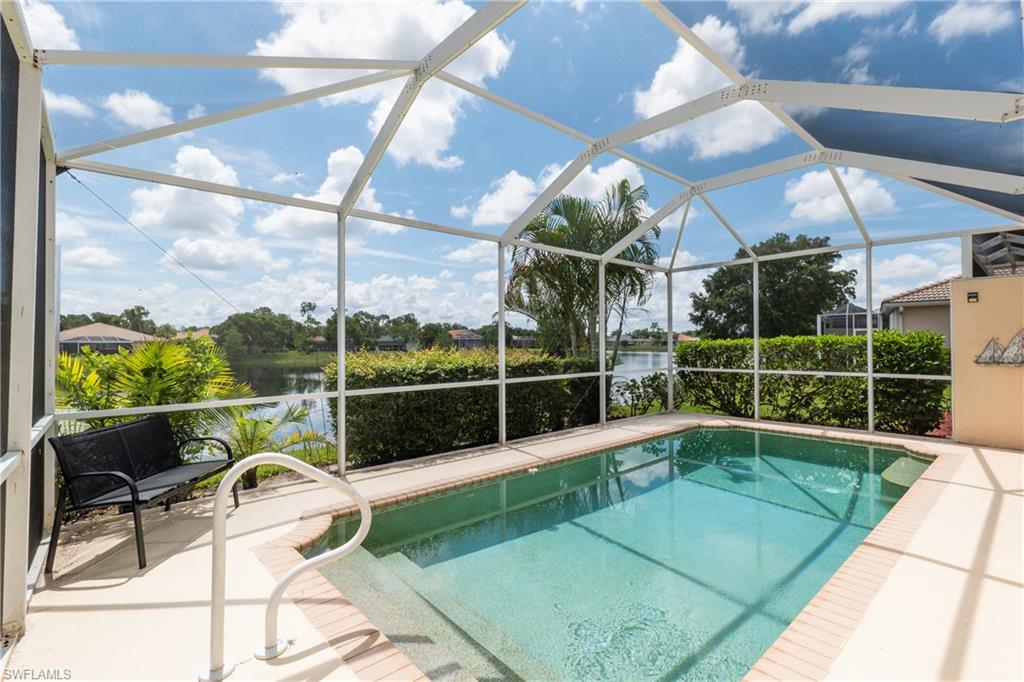 This is one of the most attractively priced pool homes in Southwest Florida—and the best part is that this lakefront villa in The Shores at Berkshire Lakes is in immaculate condition. Offered turnkey furnished, all you need to do is bring your suitcase and start enjoying the Florida lifestyle.

From the moment you step inside, you'll appreciate the soaring ceilings, abundant natural light, and open-concept design. The thoughtfully designed floor plan maximizes every square foot, making this two-bedroom plus den villa feel remarkably spacious while maintaining a warm and inviting atmosphere.

The kitchen, countertops, and bathrooms are all fully functional and well maintained. While some buyers may choose to update these areas to reflect their personal style, this has already been taken into consideration in the home's competitive pricing. In exchange, you gain one of the most sought-after features in Florida living: your own private pool overlooking a beautiful lake.

A spacious two-car garage provides valuable storage and convenience—an increasingly desirable feature for Florida homeowners.

The property has been meticulously maintained and thoughtfully upgraded over the years, including a newer air-conditioning system, newer pool heater, and electric hurricane shutters on the lanai for added comfort and peace of mind.

The Shores at Berkshire Lakes is a gated community known for its exceptional amenities, including a clubhouse with ballroom, resort-style pool, lap pool, fitness center, pickleball courts, tennis courts, bocce, billiards, and library. The low monthly HOA fee includes lawn care, cable, and internet, making ownership truly carefree.

Ideally located off Davis Boulevard, you'll be just minutes from premier shopping, dining, top-rated healthcare facilities, I-75, and only a short drive from Naples' world-famous beaches and the vibrant dining and entertainment scene of 5th Avenue South.