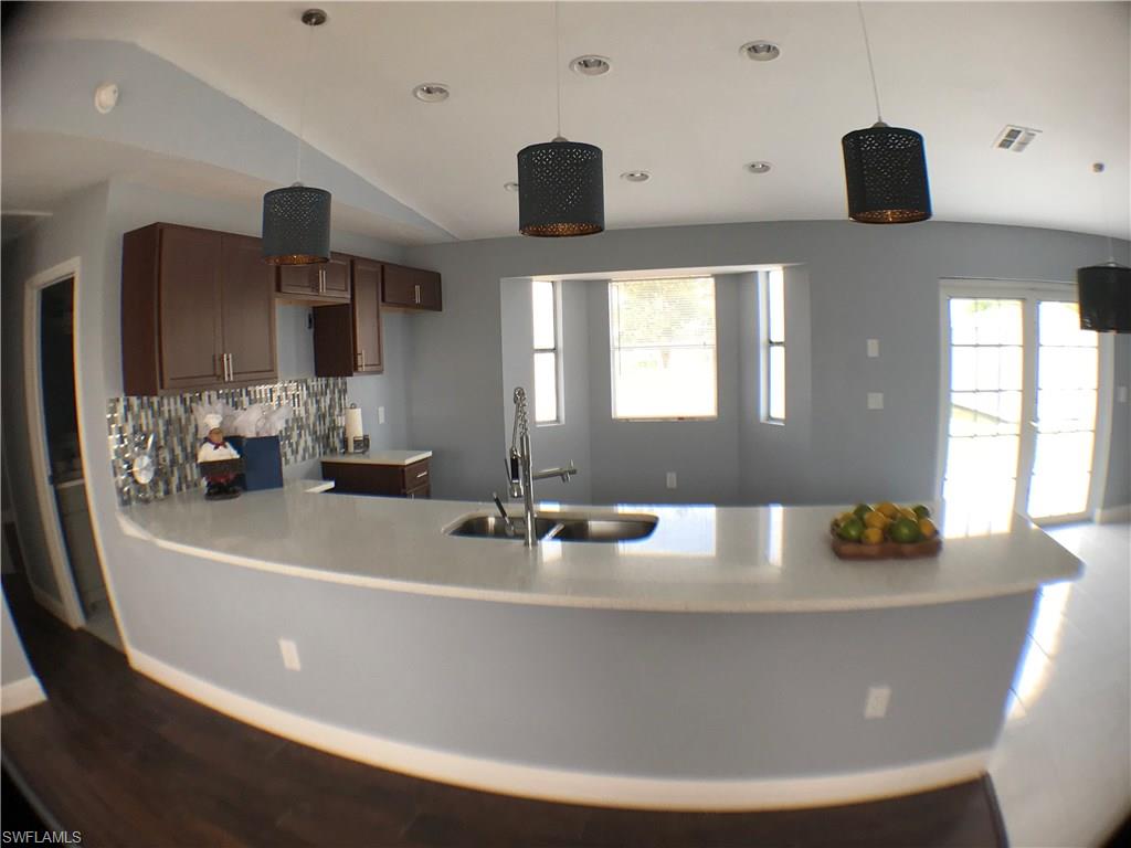 Amazing house completed remodeled in central of Lehigh Acres, Really faster access to I-75, shopping center, gas station, school, etc. Came to see a really nice kitchen with new cabinets, quartz in the top, modern pendant lights, back splash. You can save a couple hundred dollars in your home insurance because this property has the metal roof.