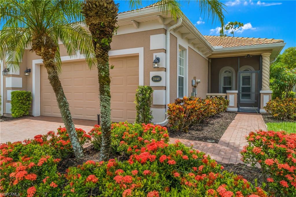 Private Preserve Views in Bella Terra's Largest Villa Floor Plan w/3bed, 2bth, 2-car garage attached villa offers nearly 1,900 sq ft of one-story living. Tucked on a quiet cul-de-sac, nothing across the street and nothing visible behind you, just preserve, and the deer and birds that come with it. Enter through a private, screened front porch, to the open kitchen, dining, and living space, which makes the home comfortable for everyday life and entertaining. The primary suite sits at the back of the home for privacy, w/two walk-in closets w/adjustable rack systems, a separate tub/shower, and dual sinks. The other two bedrooms are at the front of the home, giving everyone their own space. Recent updates are meaningful, not cosmetic. The interior was fully repainted in a neutral color, ceilings, walls, and baseboards included. New water heater 2025, new garbage disposal, barn door added in the primary bedroom leading to bathroom, a stove vent routed directly outside, and pre-wiring for a generator. The A.C. system is a Trane 17 SEER XL Series 3-ton unit installed in 2017, carrying a 12-year compressor and 10-year parts warranty, with extra ducts added to the primary bedroom and the bedroom facing the unattached neighbor for better comfort control. A Halo whole-home water filtration system was added in 2019, and the refrigerator was replaced in 2023. Both bathrooms have power flush toilets, Gerber in the primary and Kohler in the guest bath. Additional details buyers appreciate: shutters throughout with cross heads, wooden cornices over the sliding glass door shades, drainage installed between villas with downspouts tied in, a security system pre-wired for Power Over Ethernet, and garage wall organization with ceiling-mounted safe racks. Active maintenance agreements are in place with RDS and Next Plumbing, and the buyer is welcome to call either company directly with questions. Plumbing and A.C. maintenance are both current through June 2026. Roof replacement is already scheduled for 2031, and exterior painting is scheduled for early 2027, with the new owner coordinating alongside the adjoining neighbor to select a color from HOA-approved options. The extended lanai out back is where you'll want your morning coffee, quiet, private, and facing straight into the preserve. This is a maintenance-free villa, with HOA covering exterior painting, roof reserves, pest control, lawn and landscaping, irrigation, and even Hotwire cable and internet. Not in a flood zone. Bella Terra is a guard-gated community set across 100 acres of lakes and 400 acres of conservation preserve, clubhouse, fitness center, resort-style pool, hot tub, waterfall, plus pickleball, tennis, bocce, basketball, multi-use sports fields, inline skate park, and volleyball. Minutes to Publix, Miromar Outlets, RSW International Airport, Hertz Arena, & Gulf Coast Town Center, easy access to I-75. Well cared for, thoughtfully upgraded, and ready for its next owner. Some Virtual Staged Photos