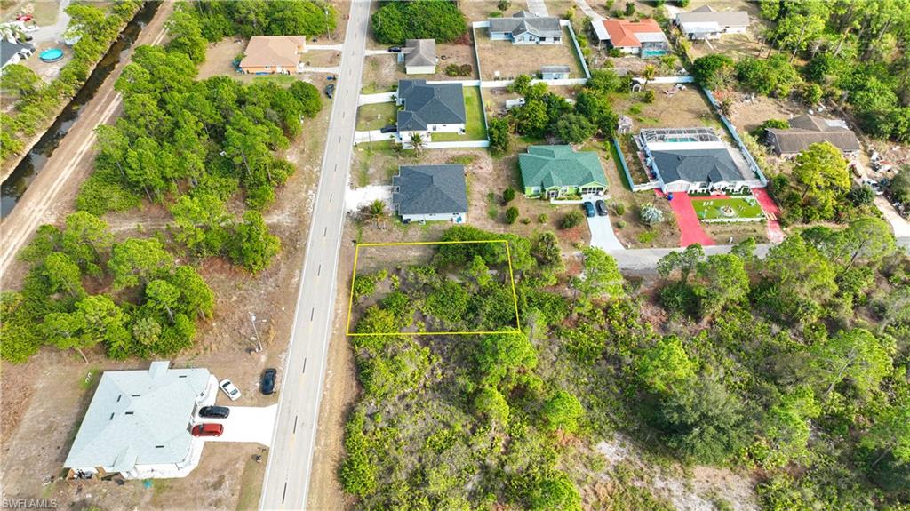 Excellent Investment Opportunity – Duplex Lot in Lehigh Acres! Lowest-Priced Lot in the Area! Don’t miss this prime duplex lot in the heart of Lehigh Acres, offering added privacy and surrounded by newly constructed homes. As the lowest-priced lot in the area, this property presents an exceptional opportunity to build a duplex for rental income or design a custom residence while investing in one of Southwest Florida’s fastest-growing markets. Conveniently located just off Joel Blvd., the lot provides easy access to State Roads 80 and 82 for smooth commuting. Enjoy nearby shopping, dining, parks, and schools—all while tucked into a quiet residential setting. Whether you’re an investor seeking strong returns or a future homeowner ready to build, this property delivers outstanding value and long-term potential.