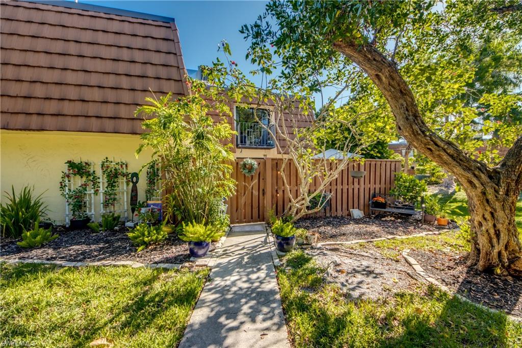 It's all about location, location, location.  Welcome to Cedarbend, where location is top notch and the upgraded finishes make it easy to love. Enjoy living conveniently close to all the shopping and restaurants up and down 41, as well as easy access to Fort Myers Beach and Cape Coral.    Then come home to this 2 bedroom/2 bathroom townhouse that checks all of the boxes.  The curb appeal potential with your own private outdoor patio is endless. Make it your own oasis and an extension of your living space.  The downstairs living area features an updated kitchen with Stainless Steel Appliances, exotic granite countertops and breakfast bar seating.  Also on the lower level is an updated full bathroom with the washer and dryer tucked at the back. The unit has tile or vinyl throughout (no carpet), extra large storage space under the stairs and extra large closets for each bedroom. Water, trash, landscaping included in the rental price along with access to the community pool.  Unit comes with 2 designated parking spaces and additional guest parking across the street.