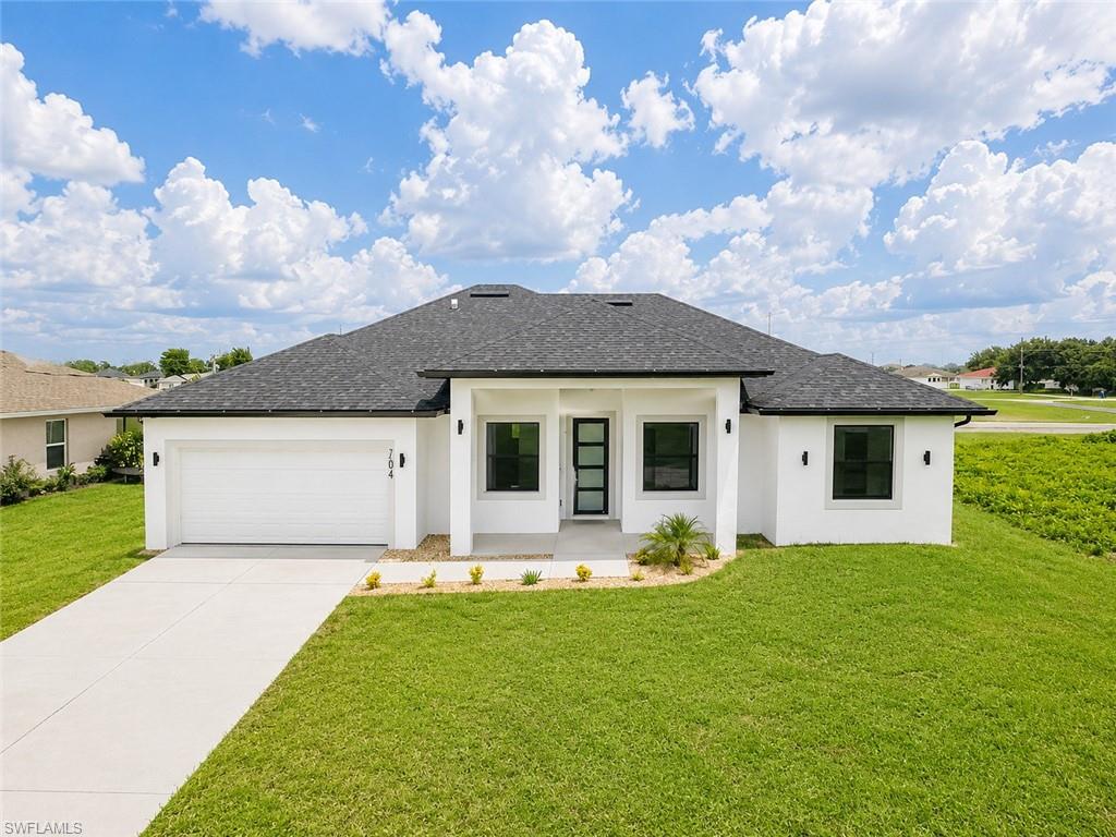 NEW CONSTRUCTION | 4 BEDROOMS + DEN | 3 FULL BATHS | TWO EN-SUITE BEDROOMS | NO HOA

Experience modern Florida living in this beautifully crafted new construction home located at 7004 Alpine Ct, LaBelle, FL 33935. Featuring 4 bedrooms, a versatile den, 3 full bathrooms, and a spacious 2 car garage, this home offers an ideal combination of luxury, comfort, and functionality.

One of the home's standout features is its dual suite layout, offering both a luxurious primary suite and a secondary en-suite bedroom, each with its own private bathroom and walk-in closet, perfect for multi generational living, guests, or added privacy.

Designed with today's lifestyle in mind, the open concept floor plan showcases large format porcelain tile flooring throughout, elegant tray ceilings, abundant natural light, and contemporary finishes. The chef inspired kitchen is the heart of the home, featuring quartz countertops, a large center island, custom cabinetry, stainless steel appliances, designer lighting, and plenty of workspace for entertaining.

The primary suite serves as a private retreat with dual vanities, a spacious walk-in shower with frameless glass enclosure, and an oversized walk-in closet. The additional bedrooms are generously sized, while the den offers endless possibilities as a home office, study, media room, or playroom.

Additional highlights include impact resistant windows and doors, modern black hardware and fixtures, a dedicated laundry room with utility sink, generous storage throughout, and a covered lanai overlooking the backyard, providing the perfect space to relax or entertain outdoors.

Situated in one of LaBelle's growing residential areas, this home offers peaceful living while remaining conveniently close to shopping, schools, restaurants, and major roadways.

Don't miss the opportunity to own this thoughtfully designed home with premium finishes and a highly desirable dual-suite floor plan. Schedule your private showing today!