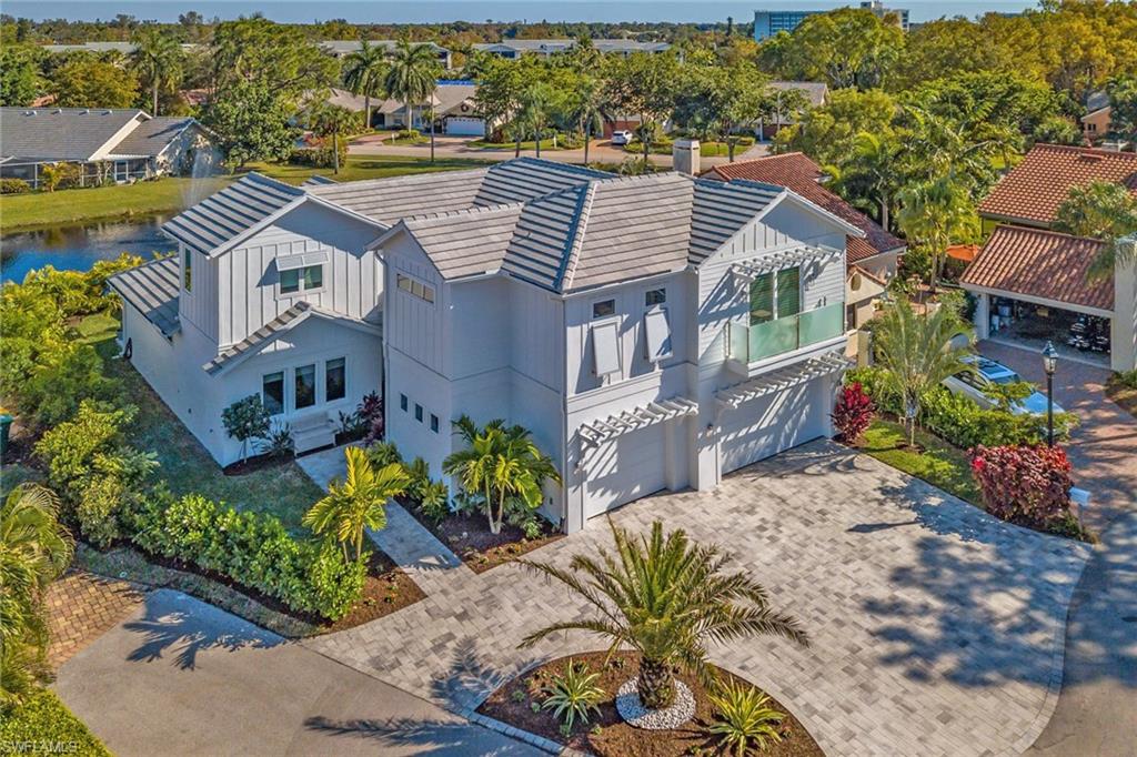 Now Available! SHORT or LONG term rental! Welcome to this stunning 3,900 sq ft home located just 1.2 miles from the beach. With an oversized3-car garage, 5 bedrooms plus a den, and 4.5 baths, this home is perfect for families. The first floor boasts two king-sized ensuites with walk-inclosets, a beautifully appointed den, a spacious laundry room, and a half bath that opens to the large lanai. You will love the kitchen complete with top of the line appliances, a large island perfect for entertaining and a butlers pantry! Upstairs, you'll find another living area with a wet bar,a second master suite with vaulted ceilings, two closets, and additional ensuite bedrooms. Northgate offers the convenience of sidewalks,streetlights, and access to Seagate Beach and Clam Pass just 1.2 miles away. Additionally this home features hurricane impact windows and doors, as well as a pocket slider leading to the outdoor living area with sandstone pavers and lush landscaping for ultimate privacy.