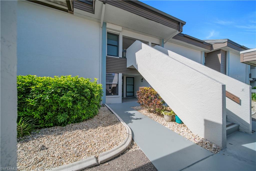 Live the golf lifestyle in this beautifully updated first-floor end-unit condo in the gated Hideaway Country Club community. This 2-bedroom, 2-bath residence features a renovated kitchen with updated cabinetry, modern countertops, newer appliances, and luxury vinyl plank flooring throughout. Enjoy relaxing golf course and water views from the enclosed lanai, perfect for morning coffee or evening sunsets. Located in Augusta Village, residents have access to a nearby community pool, patio area, grills, clubhouse dining, tennis, fitness, golf, and an active country club atmosphere. Conveniently located near shopping, dining, beaches, RSW airport, and all that Southwest Florida has to offer.