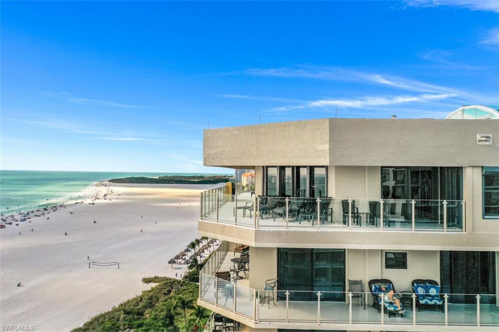 Luxury residence occupies the entire front top floor of The Prince Condominium. Originally built and designed for occupancy by the developer. The lanai, which extends to 1,376 SF with 172 lineal feet of frontage overlooking the 3-1/2 mile crescent shaped Beach. It has wrap-around balcony with ends on both sides for sun or shade from sunrise to sunset. The penthouse is located in the middle of the beach and enjoys views over the deep blue waters of the Gulf of Mexico and the entirety of the pure sand beach. The epitome of luxury is evident in this exquisitely furnished home. Double Master suites and the 3rd BR are ensuite and the 4th BR uses a hall bath. Enjoy an exquisite media room with wood walls and bookcases. The HUGE Great room features floor-to-ceiling windows and sliders overlooking the Gulf and is open and features a working log fireplace. The wet bar is backed with walled mirrors. The Master Suite is split offering a seating area with views of the Gulf, & an ensuite bathroom with Norwegian Rose marble floors and walls, a tub and separate shower. The Chef’s kitchen/good morning room is on the front of this DOUBLE FRONT penthouse taking in Gulf and beach views.
