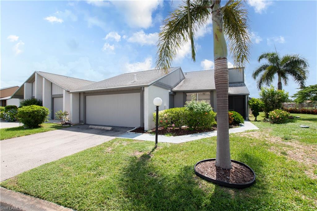 Step inside to discover three spacious bedrooms, a welcoming living room, and a formal dining area with views of the community pool. Whether you're entertaining guests, pursuing hobbies, working on crafts, or simply relaxing with a good book, you'll appreciate the generous layout and abundant living space.
The kitchen is designed for both functionality and convenience, featuring a gas cooktop and wall oven, and a pantry. One of the home's most unique features is the additional living area created from the original garage conversion. As the original model home for the community, this expanded floor plan offers valuable extra space rarely found in Woodcrest Village. Outdoor living is just as impressive. Enjoy your private screened lanai with both covered and open-air sections, perfect for morning coffee, evening cocktails, or year-round enjoyment of Southwest Florida's beautiful weather. Just off the living room, you'll find a charming outdoor atrium, ideal for tropical landscaping, a butterfly garden, or a peaceful sitting area. Storage is plentiful with two outdoor sheds, a dedicated tool room, and an indoor laundry area.
Woodcrest Village is a pet-friendly 55+ community conveniently located near shopping, restaurants, medical facilities, and the post office, making everyday living both easy and enjoyable.