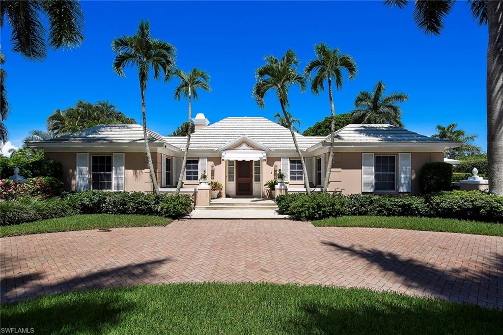 This beautiful western exposure home is just moments away from the Port Royal Beach Club. Situated on an oversized, lakefront lot, it has spectacular waterfront views and plenty of wildlife to enjoy. Whether you plan to move right in, remodel or build new, this is the most exciting new property in Port Royal.Since 1959, Port Royal has been considered Naples finest luxury home community. The Port Royal Club has a tradition of bringing neighbors, friends and families together creating memories and a strong sense of community. Through its commitment to excellence, its exceptional facilities (including tennis courts, fine dining and a private swimming pool and beach club) and uncompromising service, the Port Royal Club consistently creates a gracious atmosphere that enhances the neighborhood. Whether enjoying a relaxed sunset dinner, participating in a special event or building a sand castle on the beach, members, as well as their family and friends enjoy the finest in quality and service.