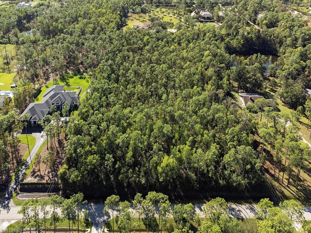 Unique opportunity to own 2 vacant lots in the highly desirable Livingston Woods area, complete with an approved FDEP Permit. Situated in the heart of Livingston Woods, this property is conveniently located near I-75, upscale shopping such as the Mercato Shops and Waterside Shops, plentiful dining options, and Community School, and First Baptist Academy are just minutes away. Additionally, it provides easy access to Livingston Road, connecting you swiftly to I-75, downtown's 5th Avenue South, 3rd Street South, and Naples' renowned white sandy beaches. Both combined lots create a 5-acre estate (see remarks). The location offers a perfect balance of privacy and proximity to urban amenities, boasting its own nature preserve and ample space to build a substantial 10,000 to 15,000 square-foot main residence along with a guest house. **Property outlined in photo is inclusive of both lots.**