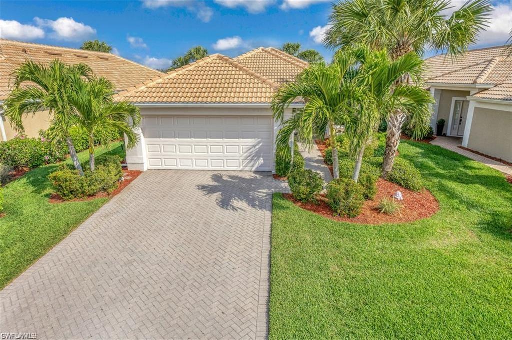 This gorgeous 2 bedroom, 2 bath with den home has an extended lanai with stunning views through the picture window screen of both the lake and golf course Colonial Country Club has amenities galore including golf, tennis, pickleball, bocci, fine and casual dining, pools throughout the community. Close to shopping, dining and airport.